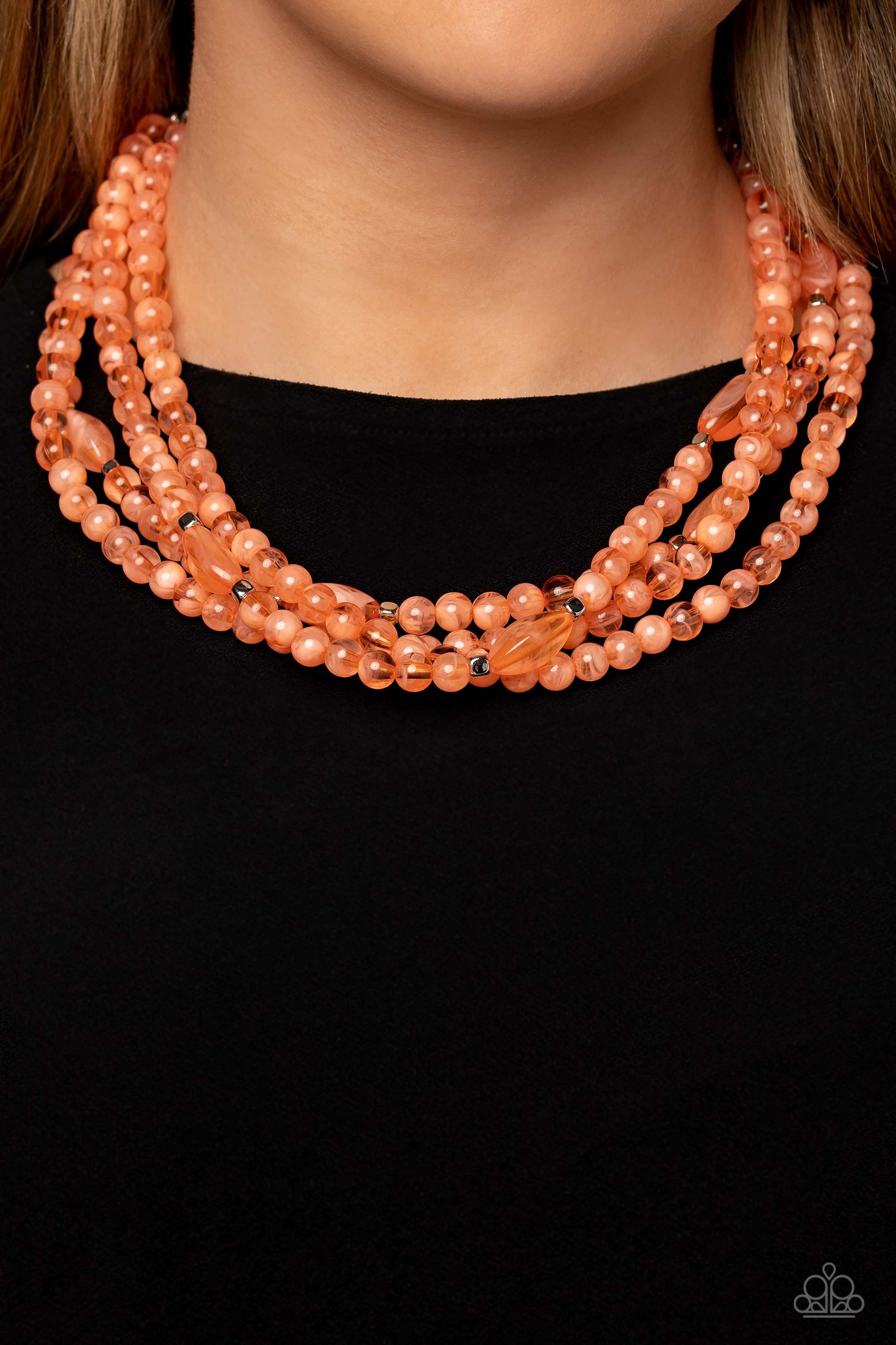 Paparazzi Accessories Layered Lass - Orange Varying in shape and color, a collection of milky round and oval Peach Pink beads are threaded along invisible wires below the collar. Shiny silver cube beads are sprinkled throughout the strands, adding hints o