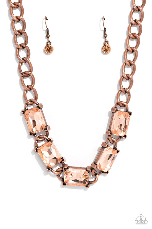 Paparazzi Accessories Radiating Review - Copper A succession of gleaming, radiant-cut, peachy gems encased in thick copper frames, coalesces around the neckline on a thick copper curb chain for an edgy statement. Features an adjustable clasp closure. Sold