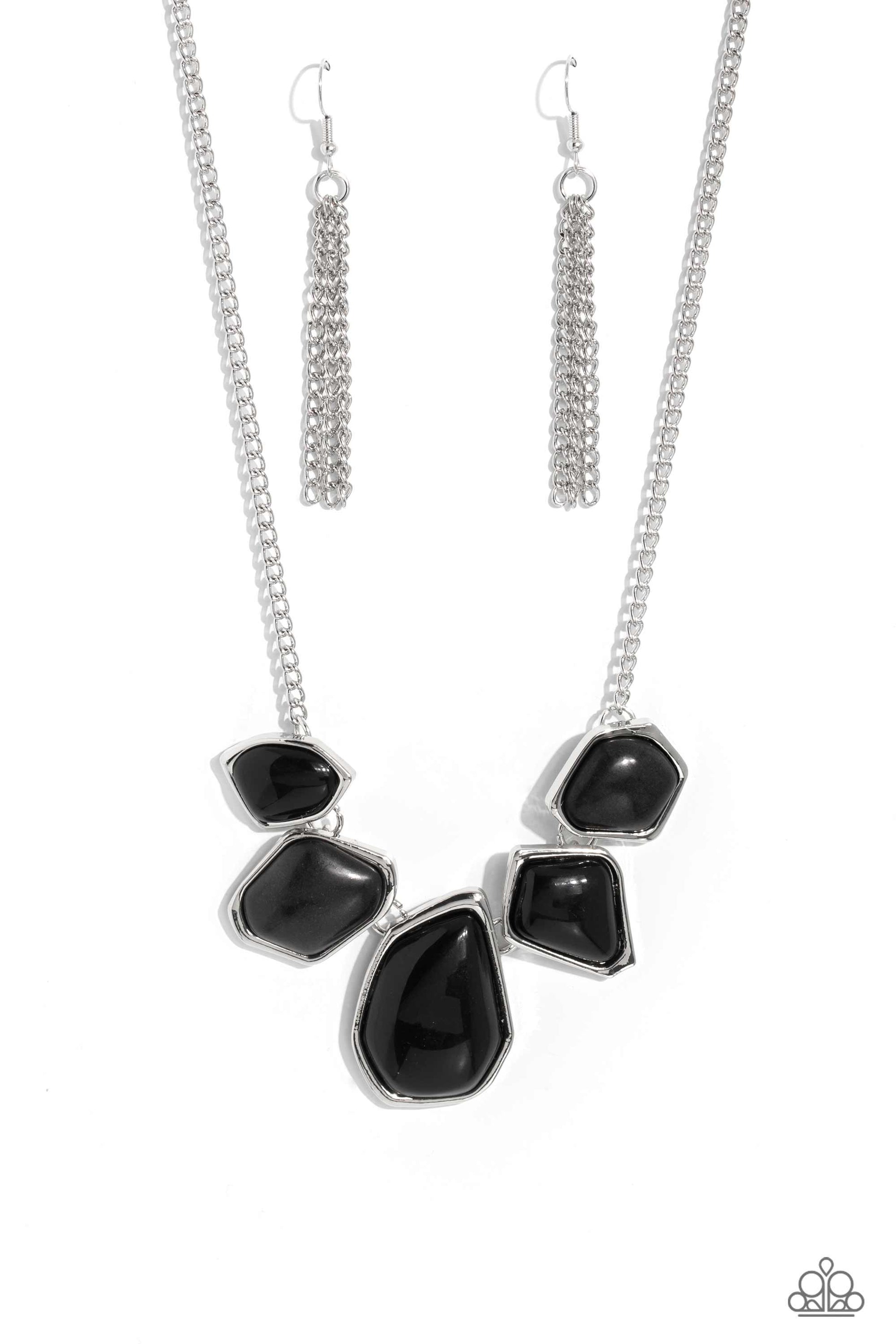 Paparazzi Accessories Beyond the Badlands - Black A collection of black defaced stones and acrylic beads are encased in sleek silver frames which link together past the collar. The irregular-shaped designs, suspended from silver chains, make a dynamically