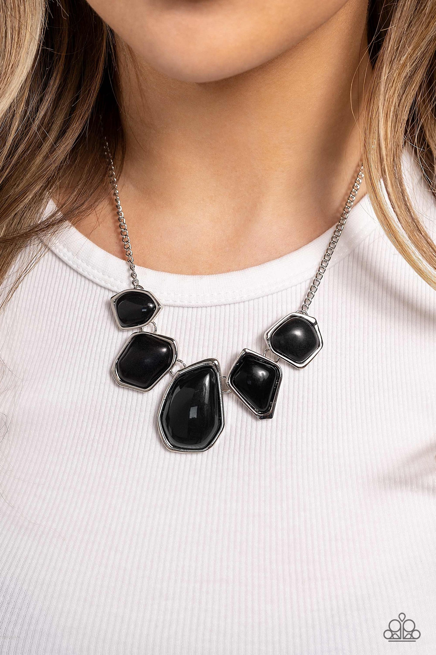 Paparazzi Accessories Beyond the Badlands - Black A collection of black defaced stones and acrylic beads are encased in sleek silver frames which link together past the collar. The irregular-shaped designs, suspended from silver chains, make a dynamically
