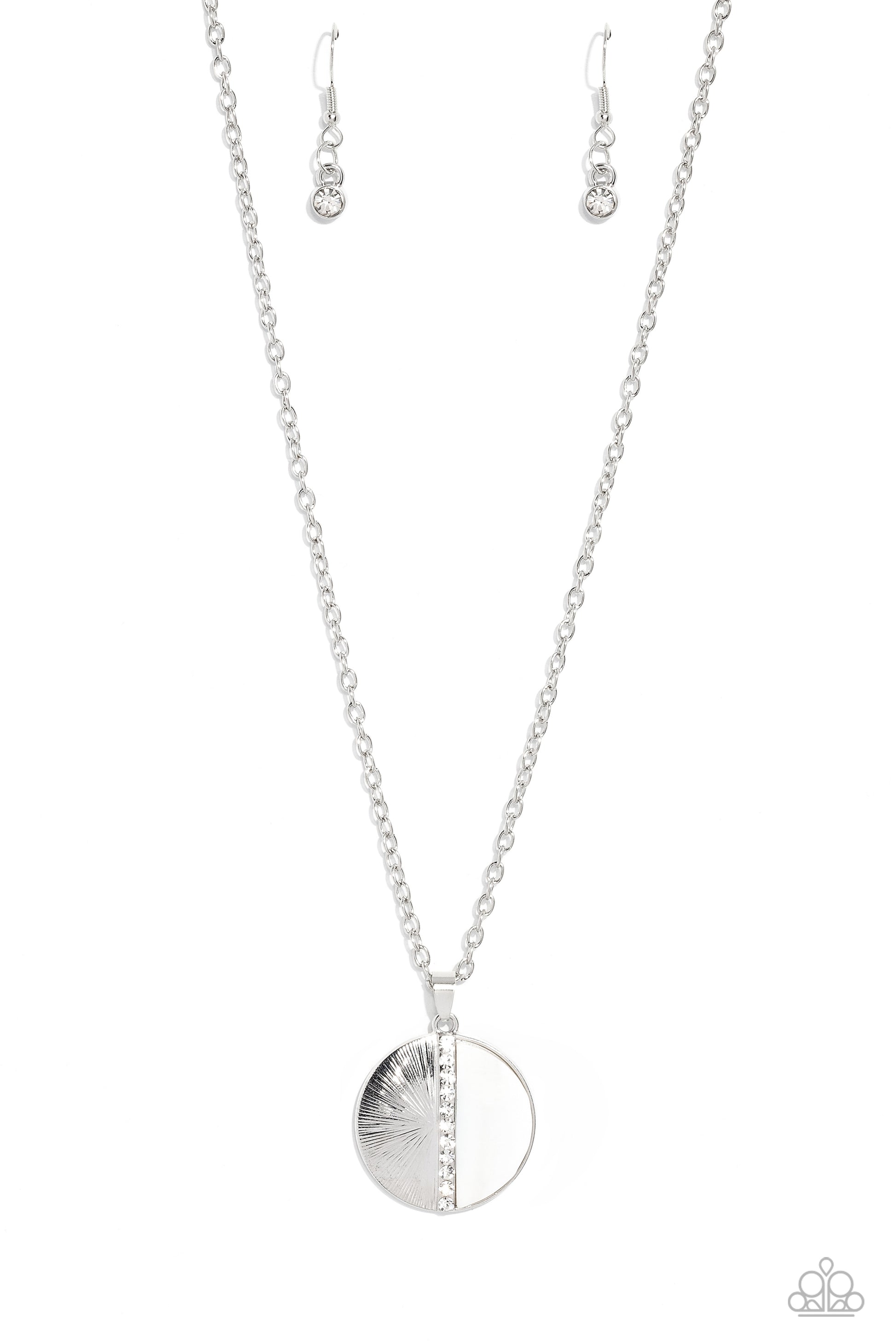 Paparazzi Accessories Captivating Contrast - White Embossed in radiant linear textures, a half-circle silver frame is nestled next to a half-circle white shell for a colorful finish. White rhinestones dot down the center of the pendant for a spritz of gli