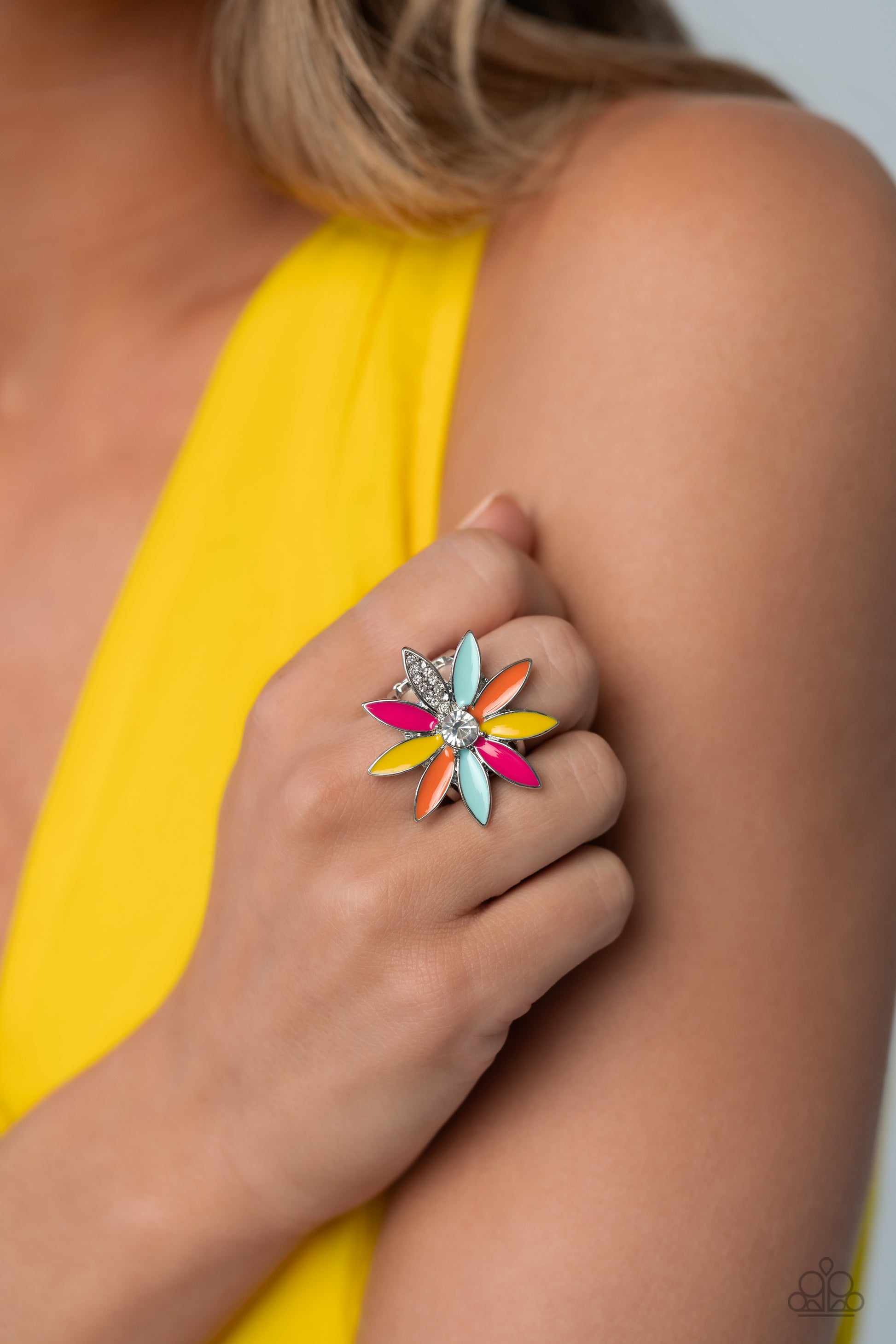 Paparazzi Accessories Lily Lei - Multi Featuring Pink Peacock, Samoan Sun, Orange Tiger and Waterspout elongated marquise petals, an oversized glittery colorful flower, with a white gem center, blooms atop an airy silver band. Dainty white rhinestones dot