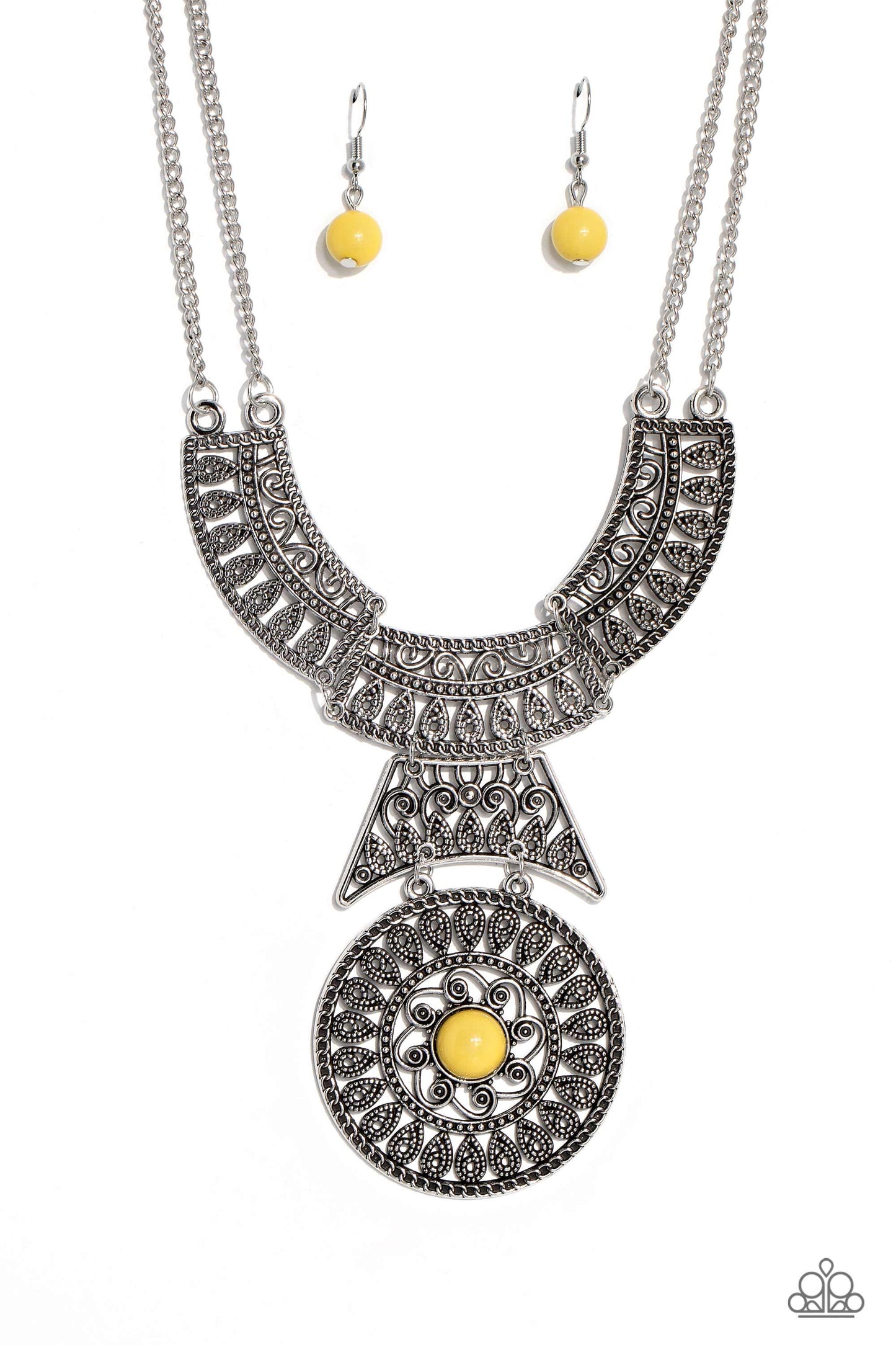 Paparazzi Accessories Fetching Filigree - Yellow Rows of oversized silver filigree frames stack into a crescent-shape that is anchored by additional silver filigree frames that layer down the neckline. Featured in the center of the lowermost circular fram