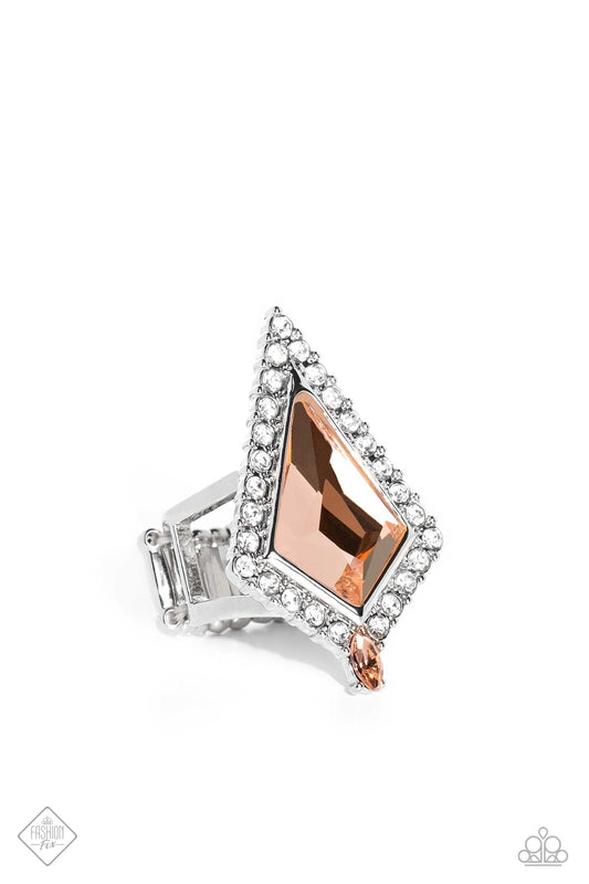 Paparazzi Accessories Stylish Studio - Orange Pressed in a border of white gems and dainty silver studs, a dramatic kite-shaped peach gem stands out atop the finger. A dainty marquise-cut peach gem is pressed into the dramatic fringe, adding an additional