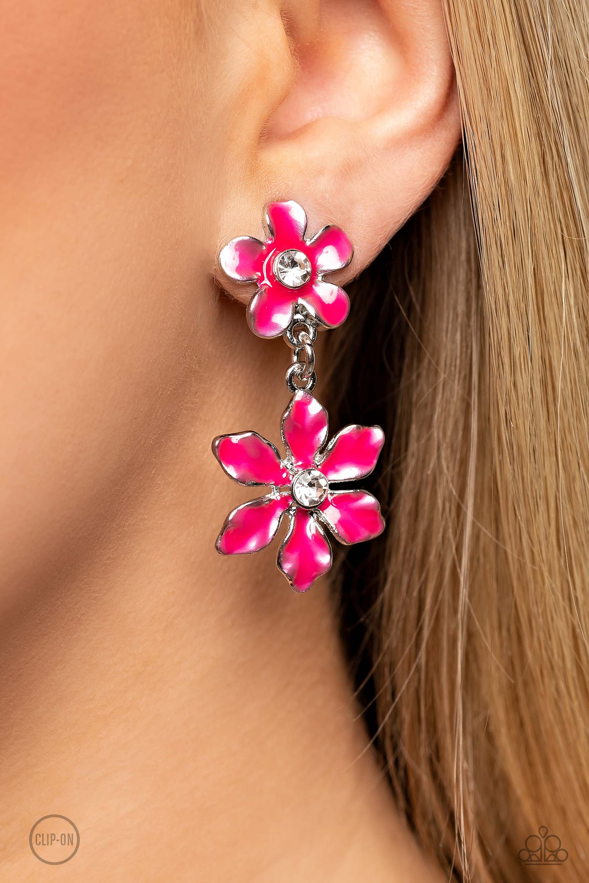 Paparazzi Accessories Transparent Talent - Pink A hot pink transparent flower with pinched petals blooms around a glittery white gem center. The large flower swings from a second transparent hot pink flower, featuring a smaller size with fanned-out petals