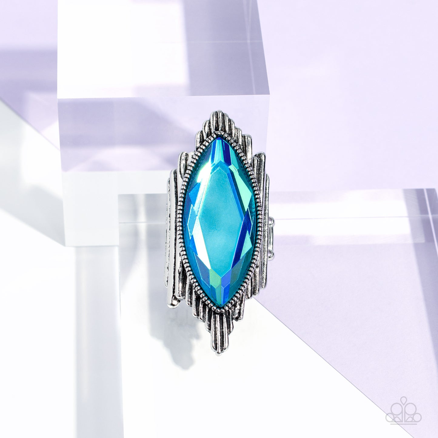 Paparazzi Accessories Stunning Showman - Green Wavy silver bars asymmetrically stack and elongate into an uneven band across the finger, resulting in an edgy fashion. Pressed in a studded silver frame and centered across the asymmetrical stack, an oversiz