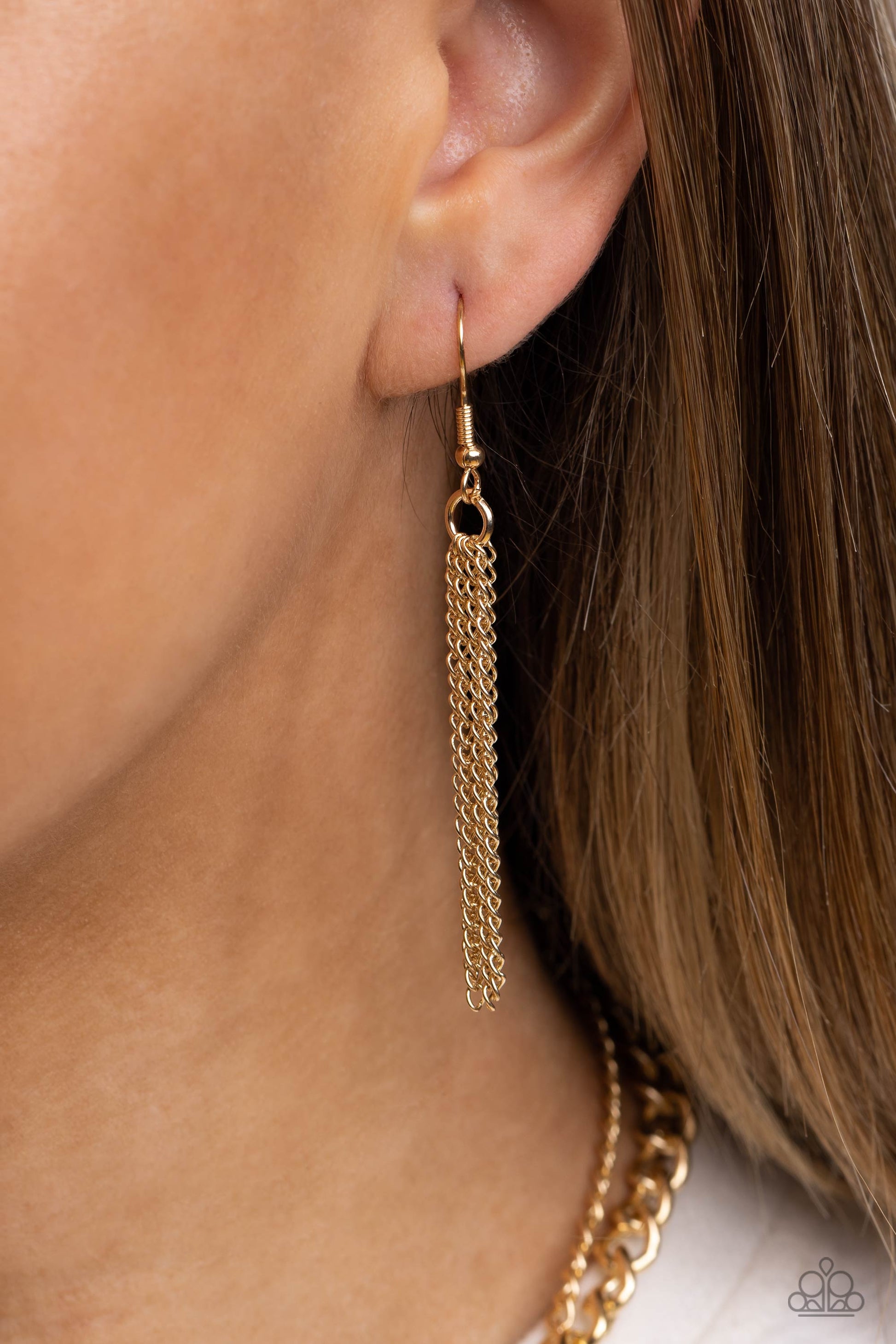 Paparazzi Accessories Night and Day - Black Featuring a yin-yang design, a gold moon with rhinestone-dusted stars rests on the black curve, while a gold sun with rhinestone beams of light rests on the white curve for a balanced, studded display down the n