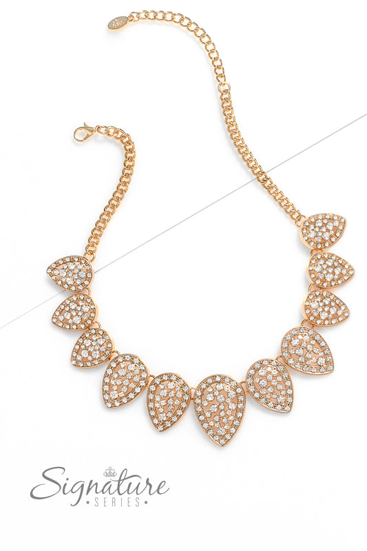 Paparazzi Accessories The Cody Gold teardrops are dusted in white rhinestones and flipped upside down, fanning out along the collar in a glittery display. Increasing in size as they lead to the center, each teardrop sparkles intensely, showcasing its pris