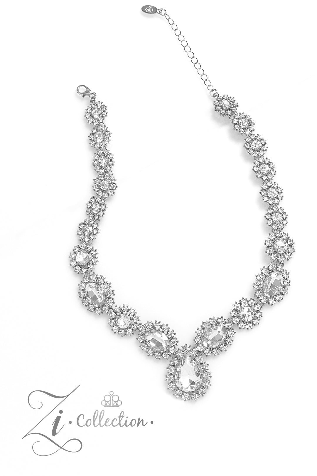 Paparazzi Accessories Everlasting - White Brilliant white rhinestones, in both round and oval cuts, link around the neck in a stunning display. Each dramatically faceted gem is encircled by tiny white rhinestones set in pronged fittings, bringing a vintag