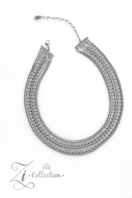 Paparazzi Accessories Tenacious - White Flat, silver snake chains alternate with rows of explosive sparkle, layering into a dynamic lineup of grit and glitz. The meticulous placement and uniform sizing of the glittery, white rhinestones are contrasted by