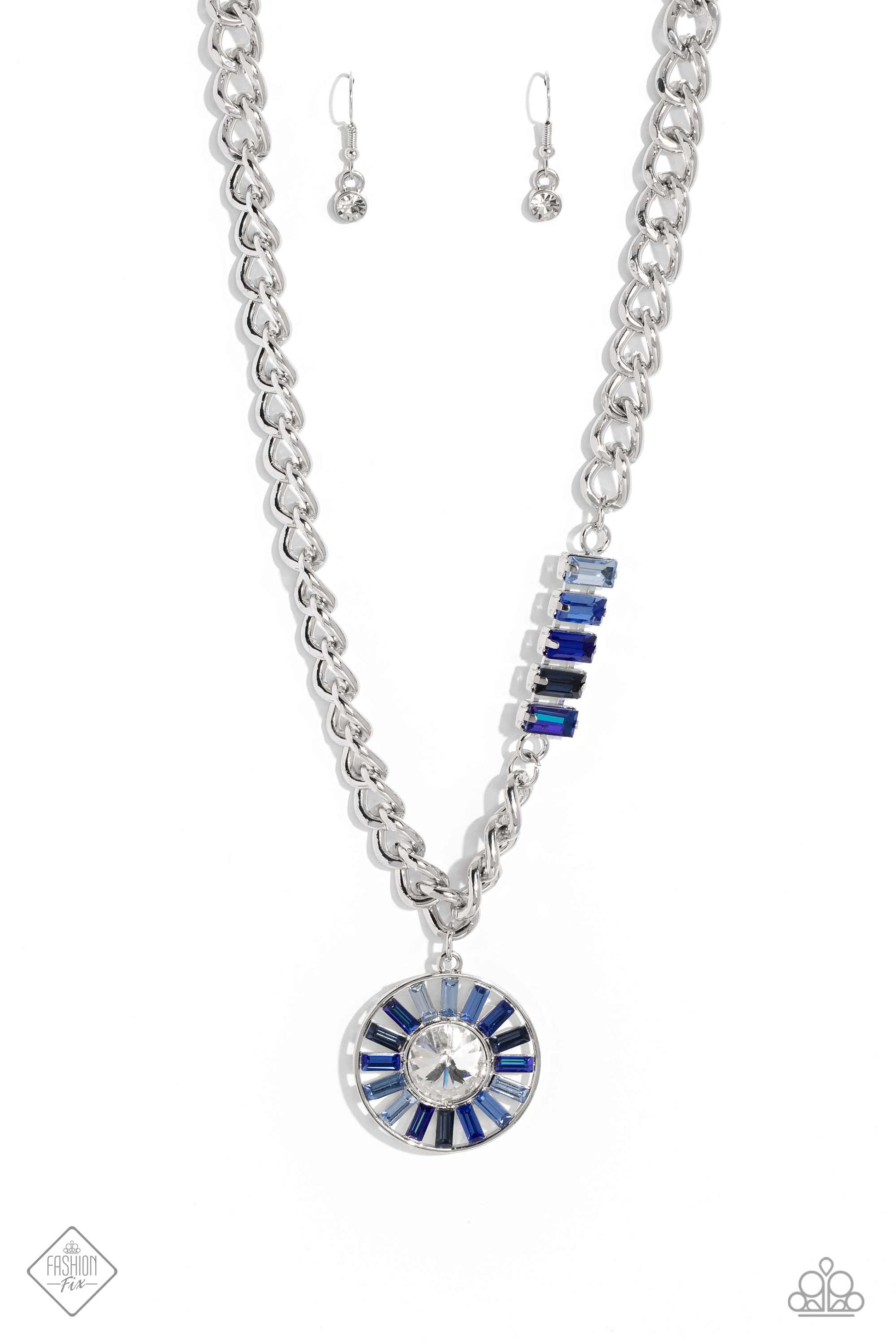 Paparazzi Accessories Tiered Talent - Blue An exaggerated white gem is encircled by a collection of emerald-cut gems in varying shades of blue, creating a hypnotic pendant that swings from a thick silver curb chain. Five additional emerald-cut gems in the