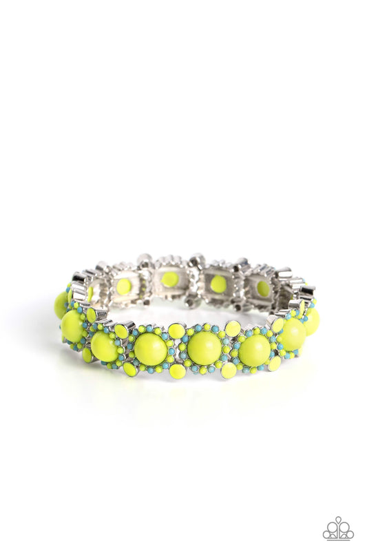 Paparazzi Accessories Pop Art Party - Green Dotted in glossy Love Bird beaded centers, turquoise and Love Bird beaded silver floral frames delicately link around the wrist on stretchy bands for a whimsical arrangement. Separating each floral display, addi