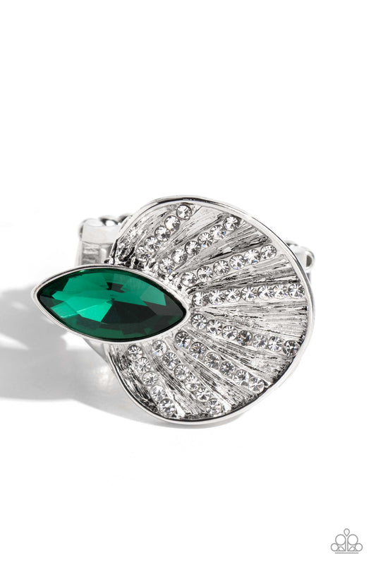 Paparazzi Accessories Fan Dance Dazzle - Green An asymmetrical silver disc, featuring linear layers of dainty white rhinestones against a textured backdrop, reflect light off its every angle from airy silver bands. A marquise-cut green gem interrupts the