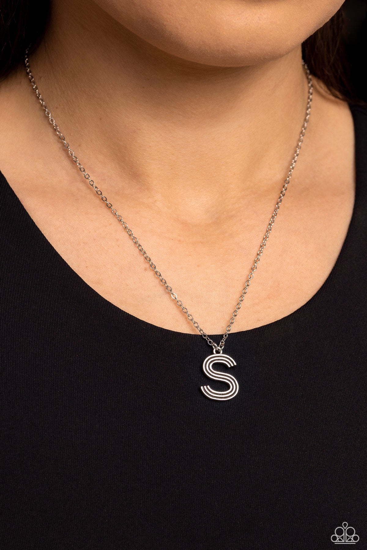 Paparazzi Accessories Leave Your Initials - Silver - S Etched in linear texture, a silver letter "S" hovers below the collar from a dainty silver chain, for a sentimentally simple design. Features an adjustable clasp closure. Sold as one individual neckla