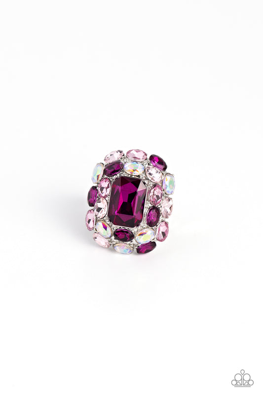 Paparazzi Accessories Perfectly Park Avenue - Pink A faceted radiant-cut fuchsia gem is pressed into an elaborate silver frame filled with blinding oval-cut gems in varying shades and opacities of pink gems for a dynamically colorful statement atop the fi