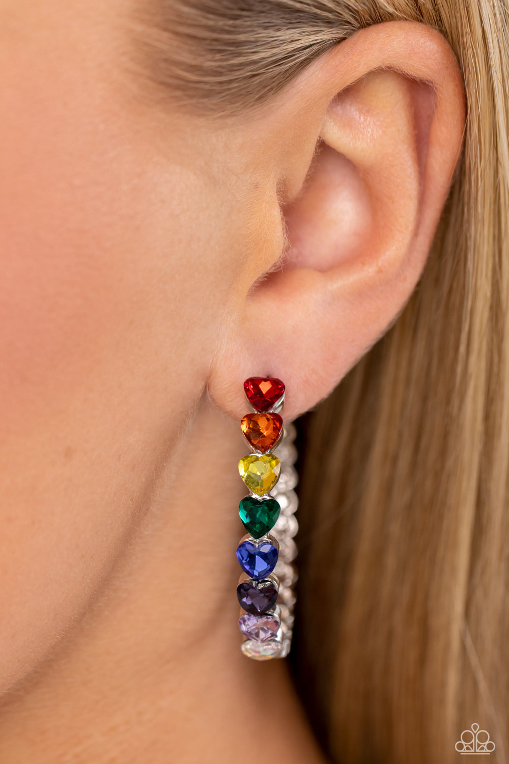 Paparazzi Accessories Hypnotic Heart Attack - Multi 2 Featuring a scalloped heart frame, glittery heart rhinestones in colorful shades and iridescence slowly decrease in size as they curve down the ear to meet dainty silver hearts for a romantic statement
