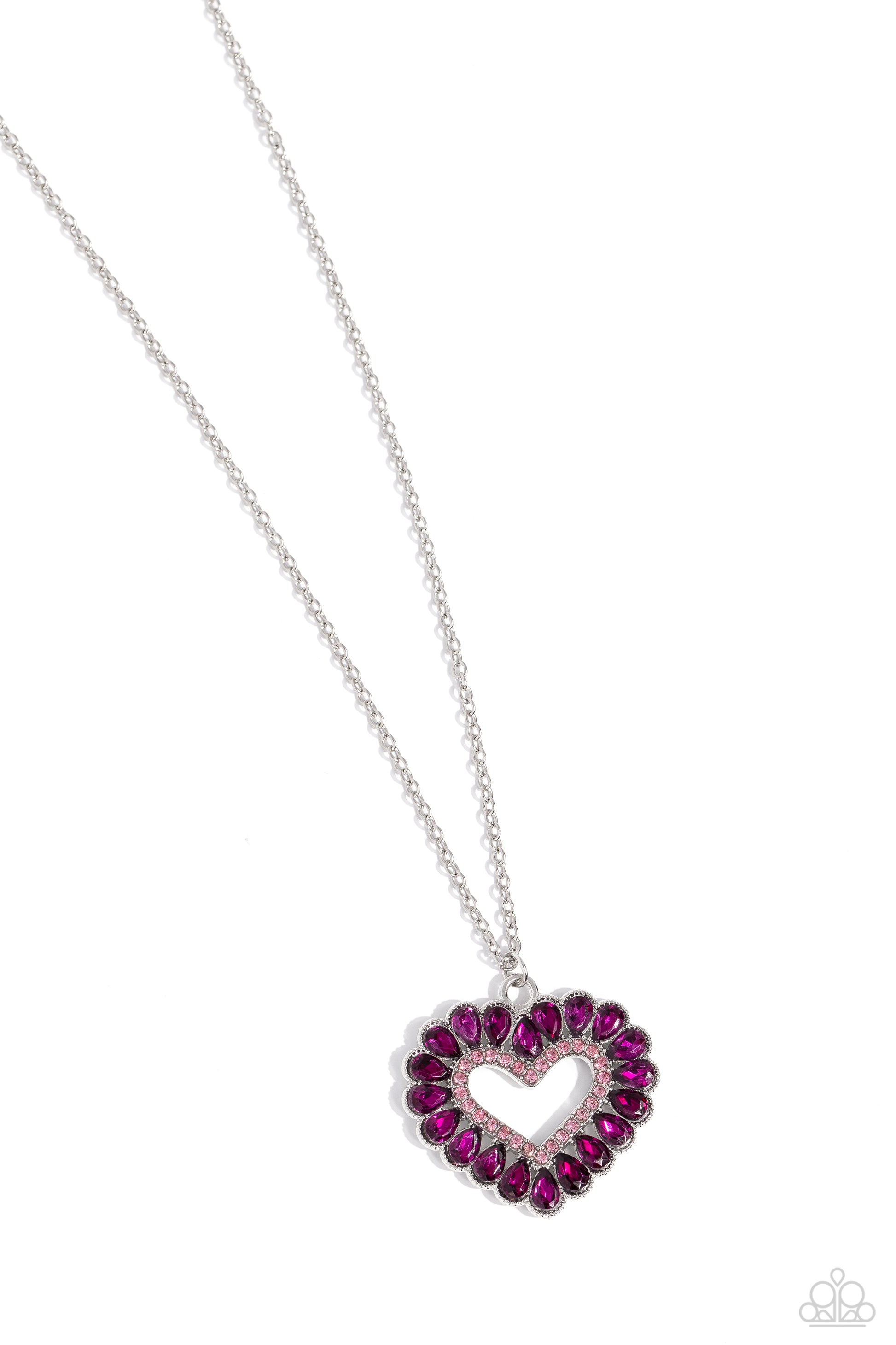 Paparazzi Accessories FLIRT No More - Pink Featuring silver studded frames, fuchsia teardrop gems form into a glitzy heart pendant at the bottom of a dainty silver chain. Light pink rhinestones border the inner heart frame, leaving an airy heart silhouett