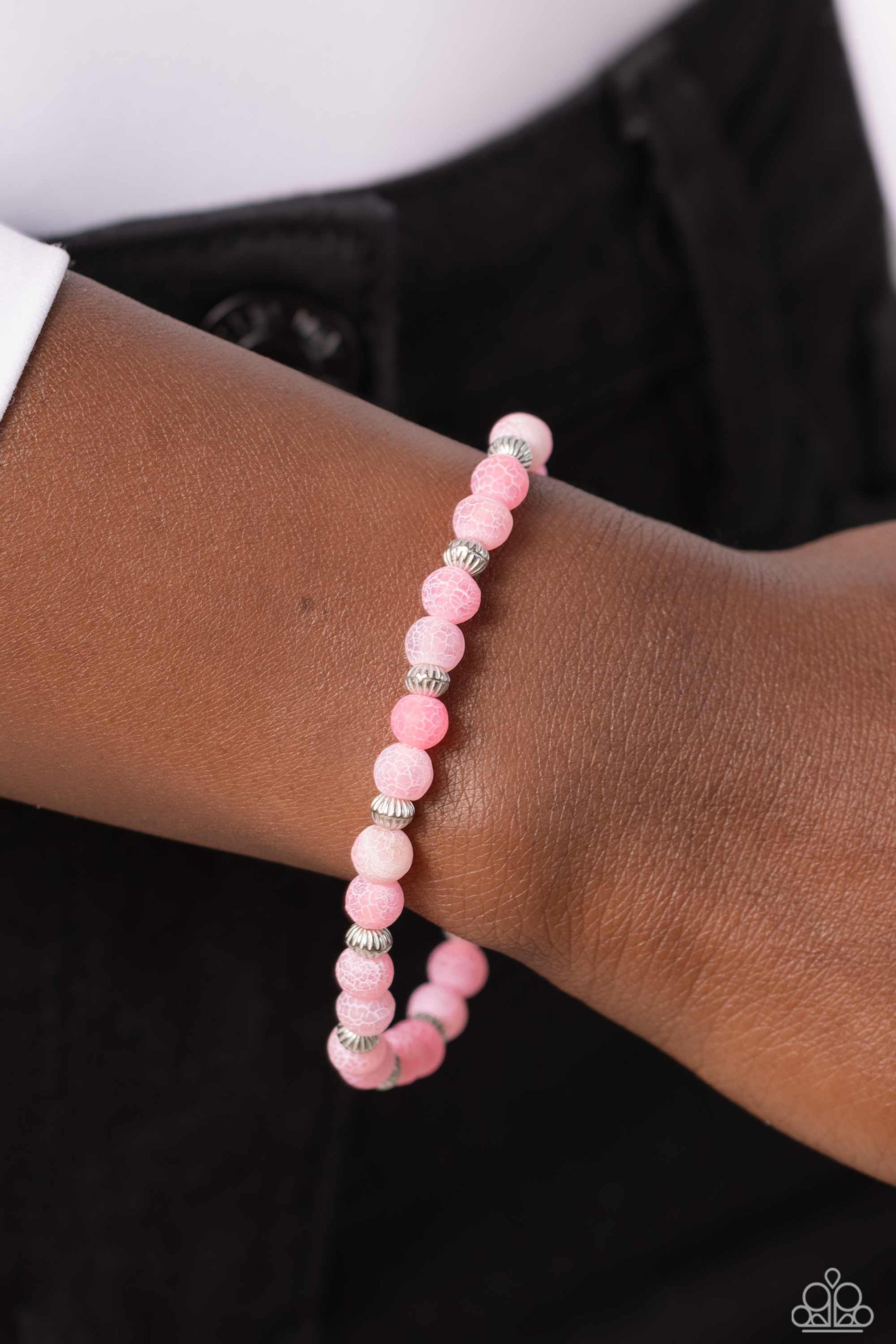 Paparazzi Accessories Ethereally Earthy - Pink Featuring a dainty crackle motif, pink stones in varying shades and textured silver beads wrap around the wrist on a stretchy band for an ethereally earthy statement. As the stone elements in this piece are n