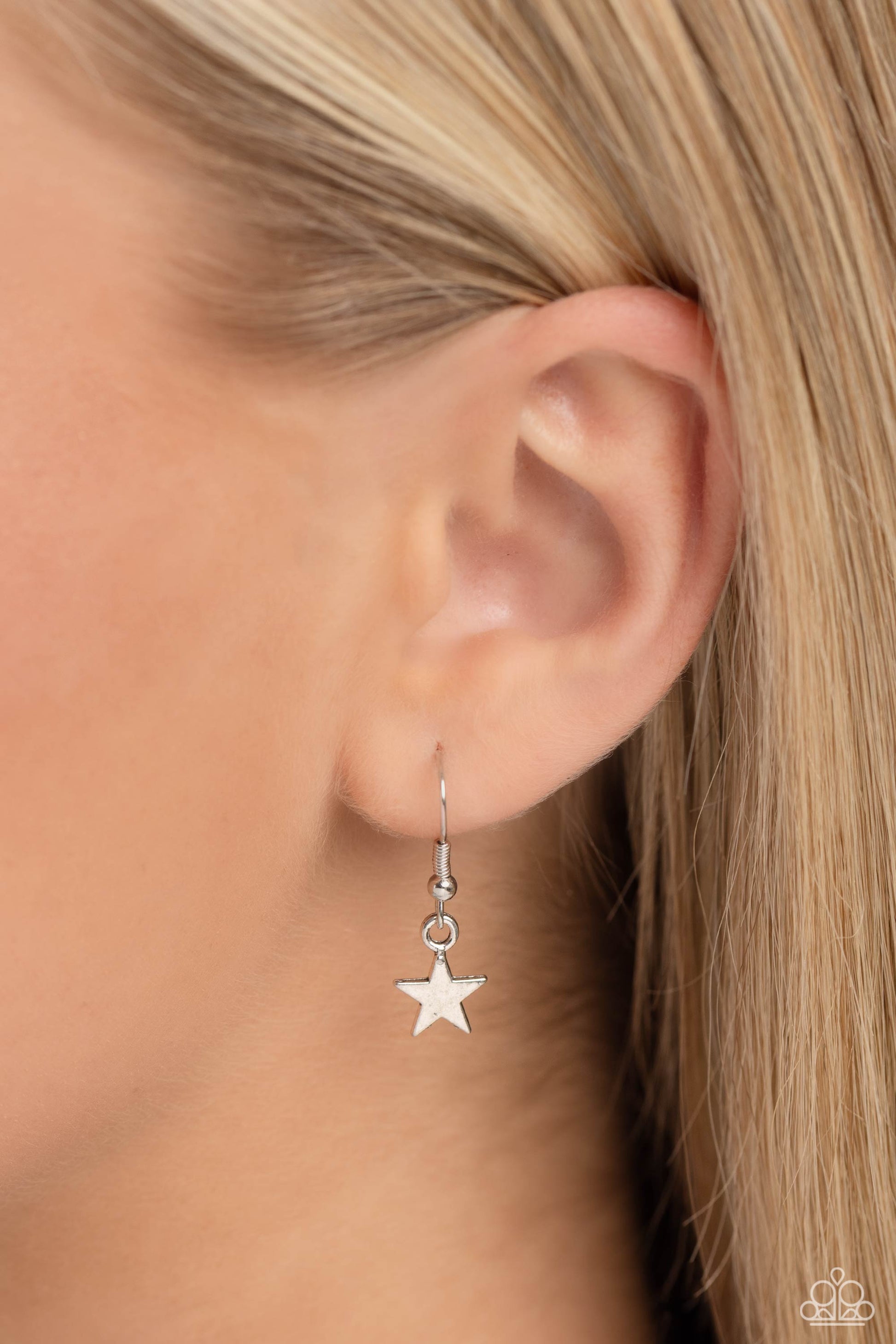 Paparazzi Accessories Hey Batter Batter! - Silver An assortment of charms, including a star, baseball, and baseball bat, glide along a dainty silver snake chain, creating a simply sporty display below the collar. Features an adjustable clasp closure. Sold