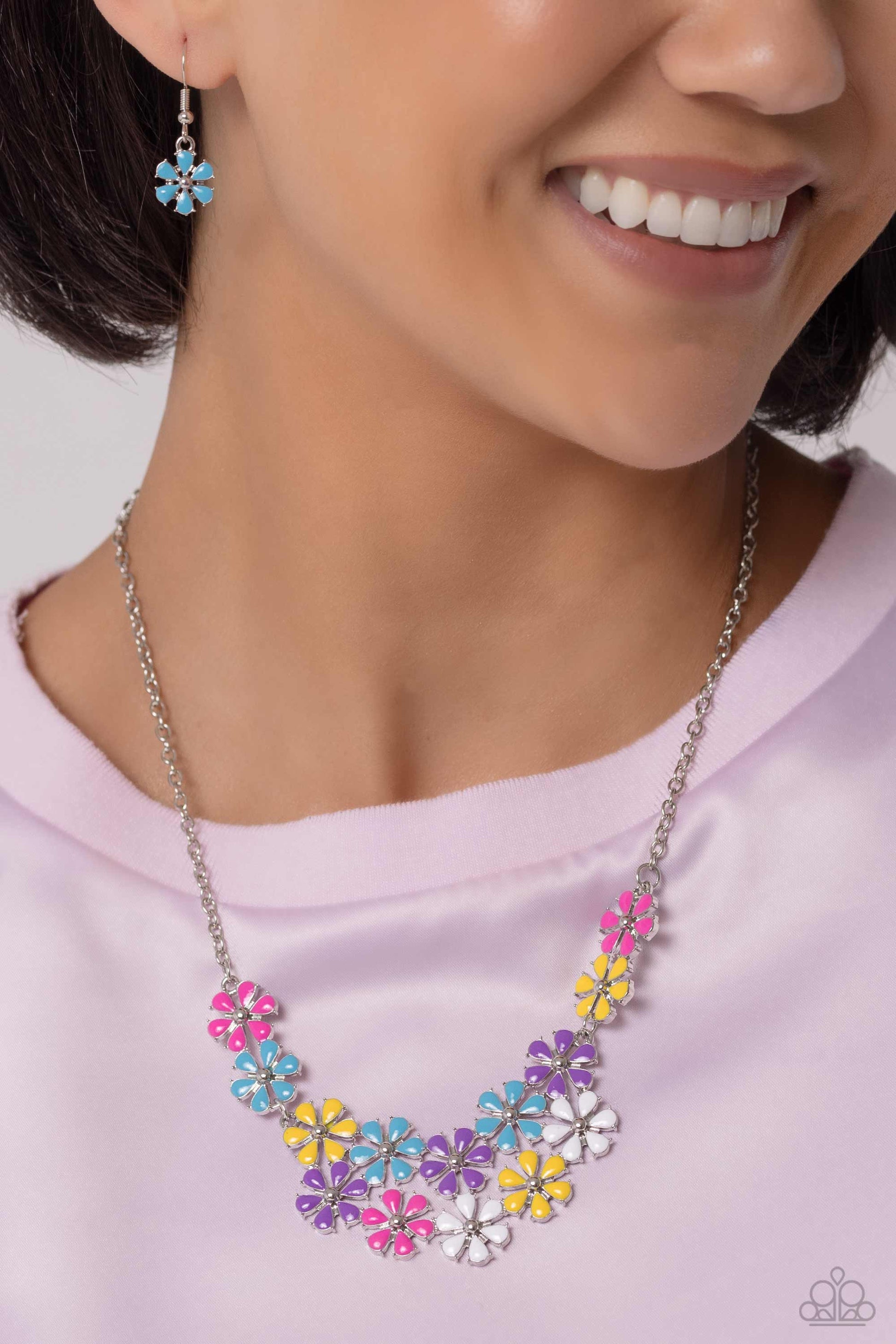 Paparazzi Accessories Floral Fever - Multi Painted in vivacious shades of hot pink, turquoise, yellow, purple, and white, a collection of silver studded flowers glide across the chest from a dainty silver chain for a whimsical array. Features an adjustabl