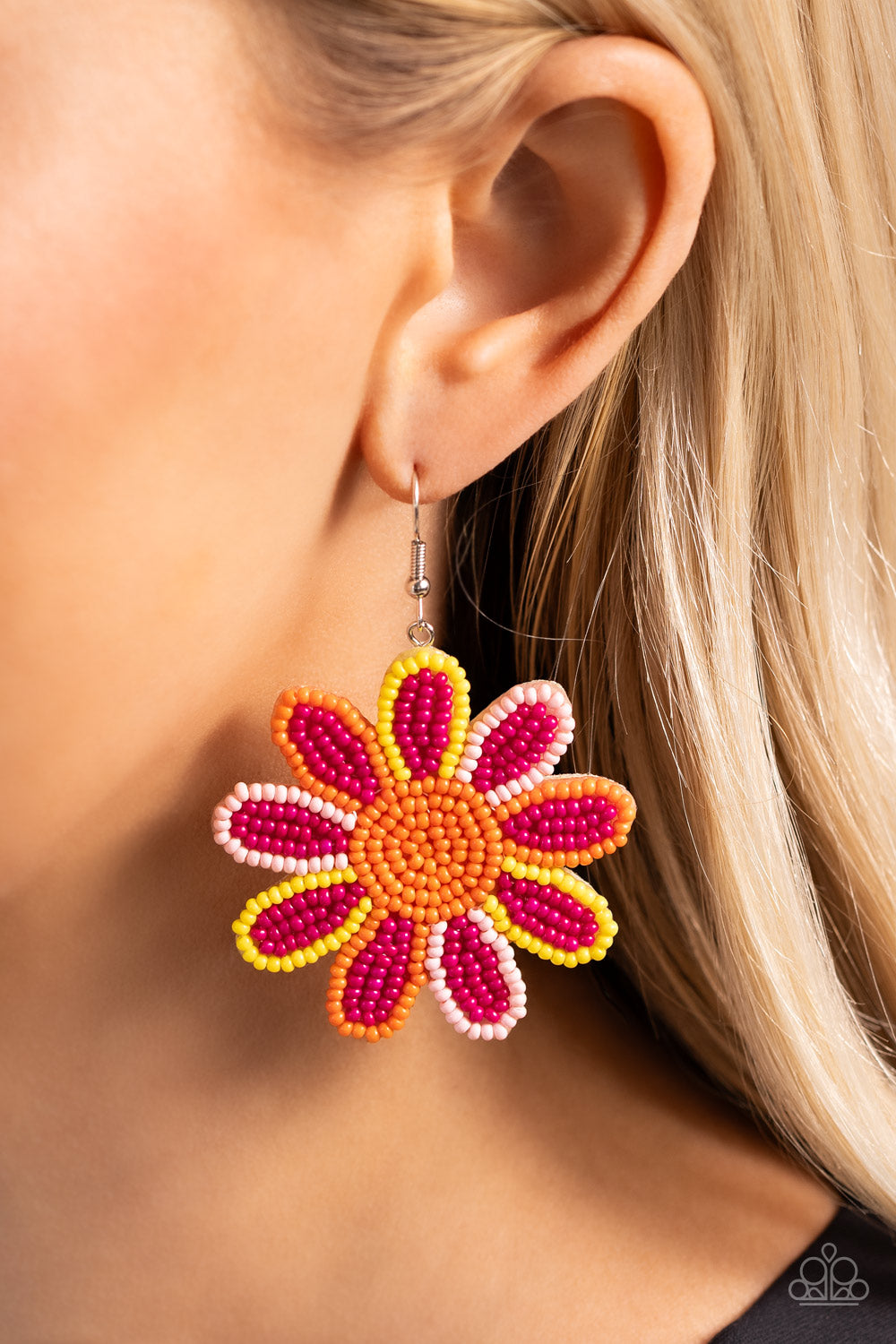 Paparazzi Accessories Decorated Daisies - Pink Layers of hot pink seed bead petals, encased in seed bead frames of yellow, baby pink, and orange, fan out from an orange seed bead center, blooming into a textured floral lure. Earring attaches to a standard