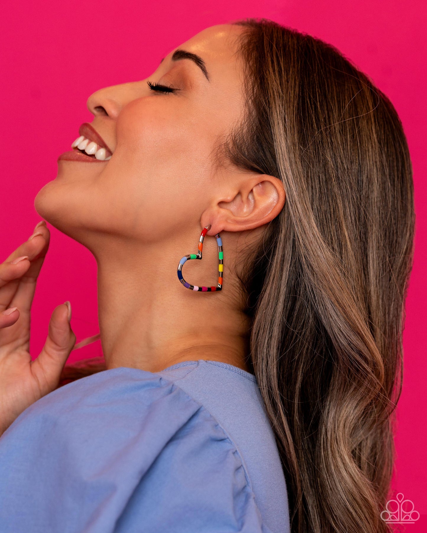 Paparazzi Accessories Striped Sweethearts - Multi A simple silver hoop of silver curves around the ear into a heart-shaped frame. Featured on the heart frame, multicolored stripes alternate with the high-sheen finish of the silver for a lasting impression
