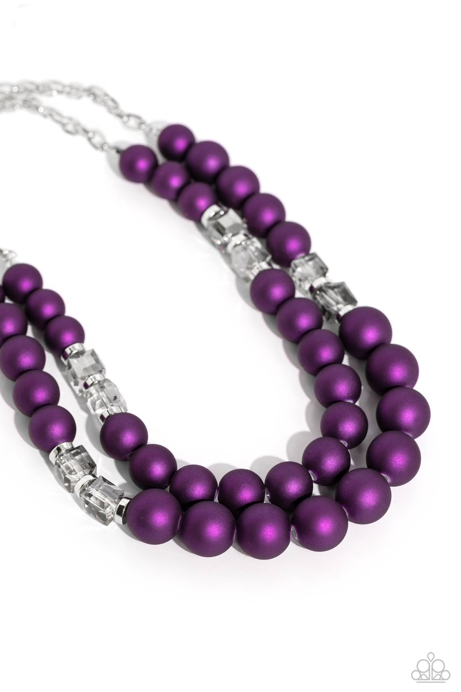 Paparazzi Accessories Shopaholic Season - Purple Two rows of oversized purple beads featuring a subtle shimmer, silver accents, and clear gray cubed beads fall below the collar on silver paperclip chains, creating refined, colorful layers. Features an adj