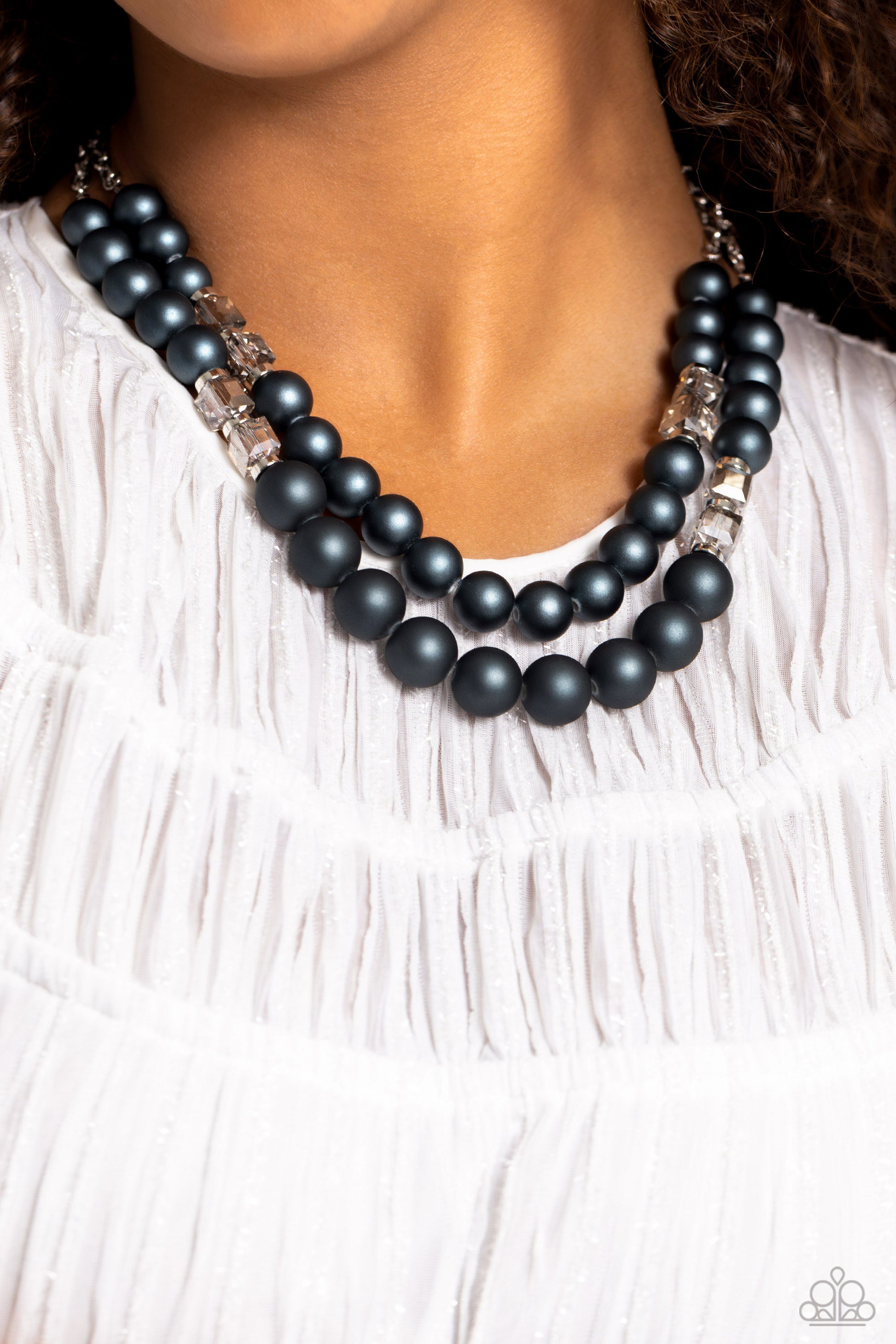 Paparazzi Accessories Shopaholic Season - Blue Two rows of oversized blue beads featuring a subtle shimmer, silver accents, and clear gray cubed beads fall below the collar on silver paperclip chains, creating refined, colorful layers. Features an adjusta