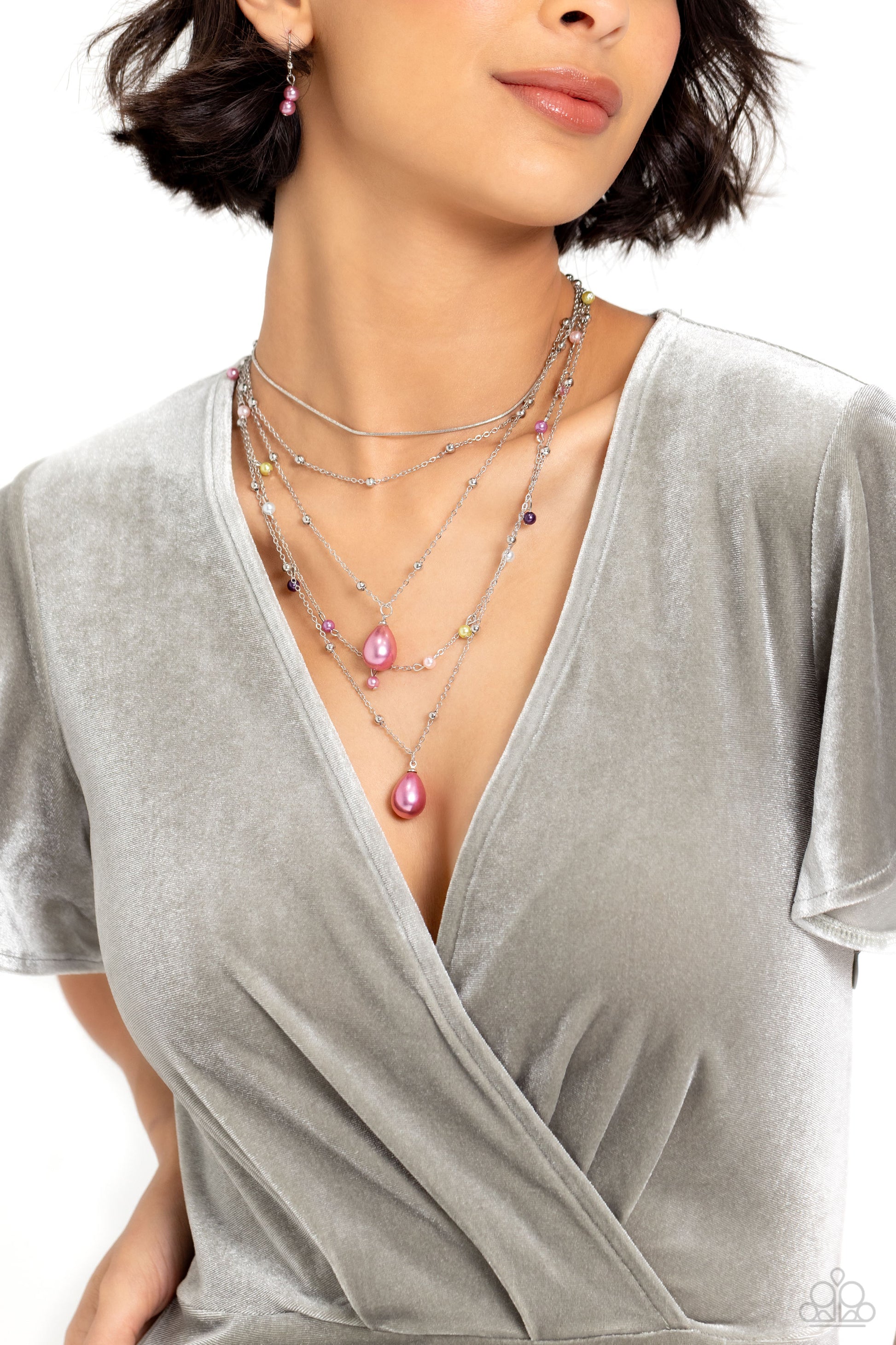 Paparazzi Accessories SASS with Flying Colors - Multi Dainty multicolored pearls and silver beads trickle along an assortment of silver chains, creating shimmery layers across the chest. Two exaggerated light orchid pearly teardrops cascade from the botto