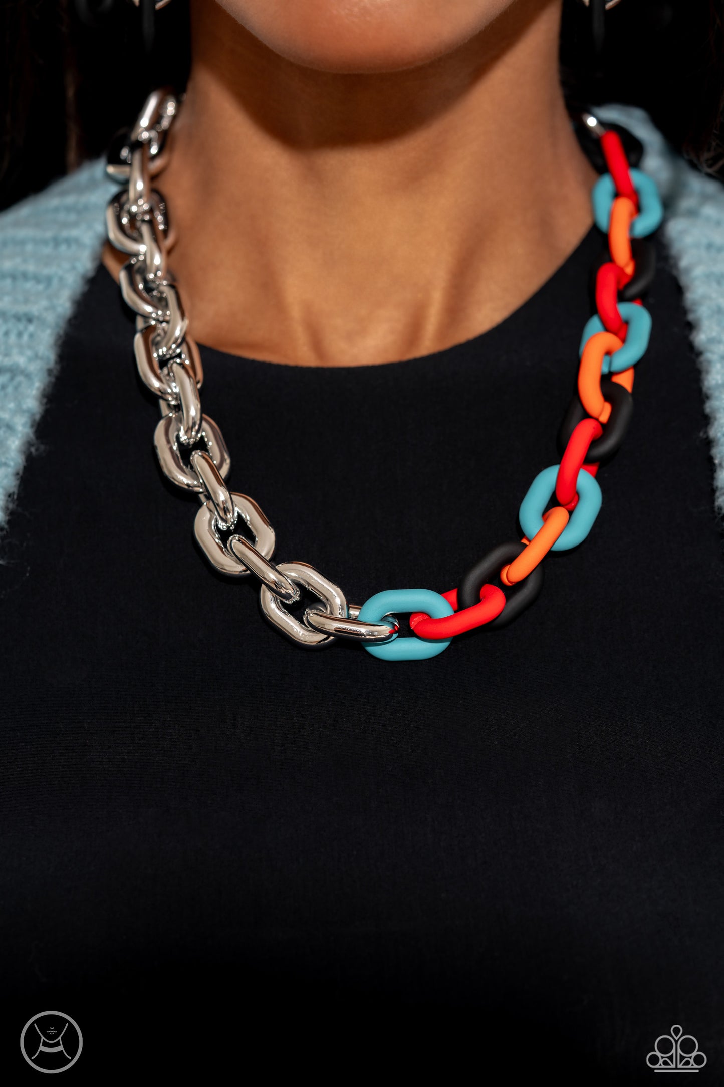 Paparazzi Accessories Contrasting Couture - Black A strand of oversized silver curb chain collides with black, red, turquoise, and orange acrylic curb links to create an abstract blend of grit and color. The oversized links of the colored curb chain offse