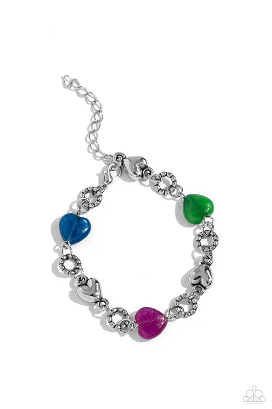 Paparazzi Accessories I Can Feel Your Heartbeat - Multi Heart-shaped lapis, jade, amethyst, and sleek silver hearts alternate along the wrist. Bubbly textured silver rings separate each heart shape infusing the romantically earthy design with a touch of h