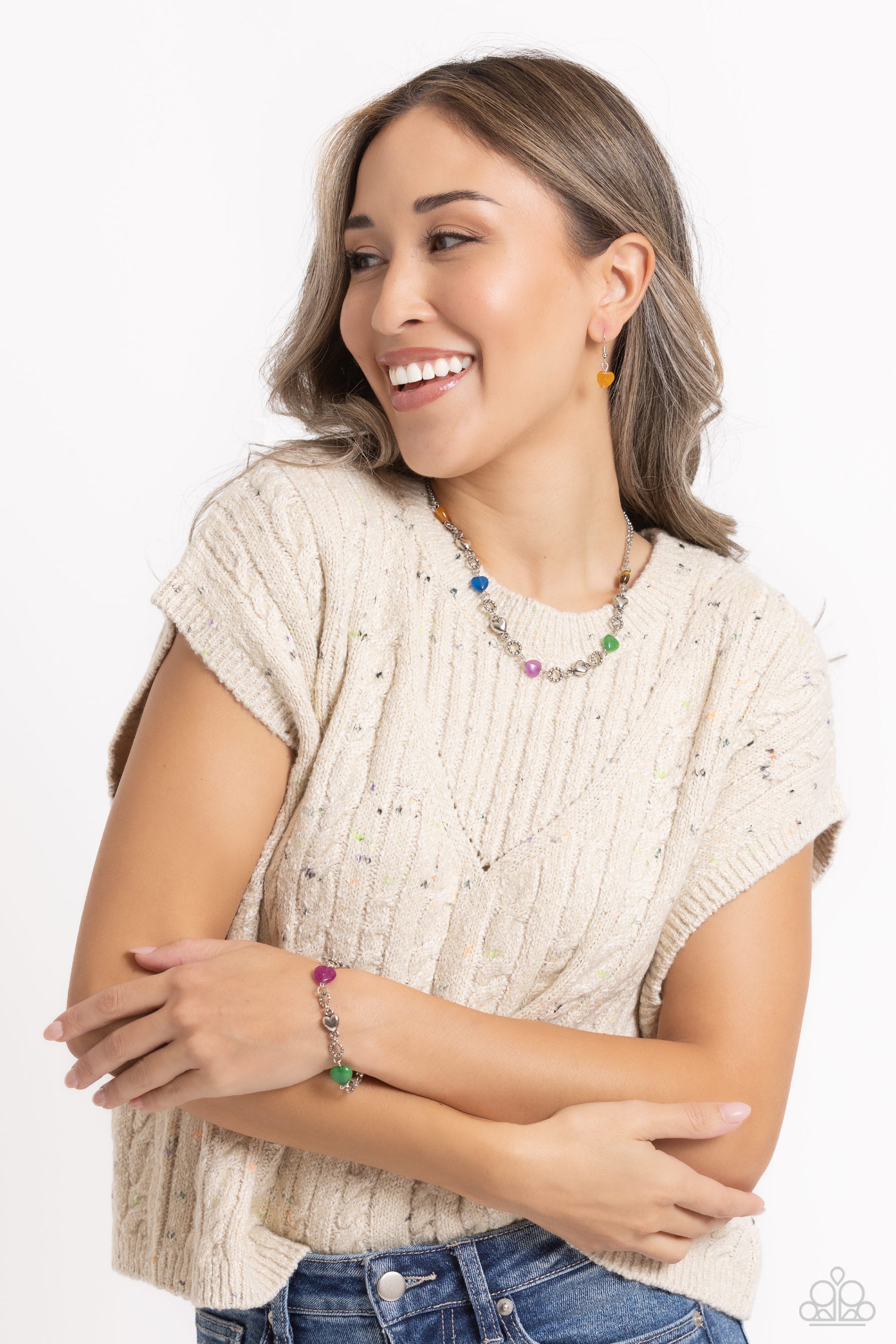 Paparazzi Accessories I Can Feel Your Heartbeat - Multi Heart-shaped lapis, jade, amethyst, and sleek silver hearts alternate along the wrist. Bubbly textured silver rings separate each heart shape infusing the romantically earthy design with a touch of h