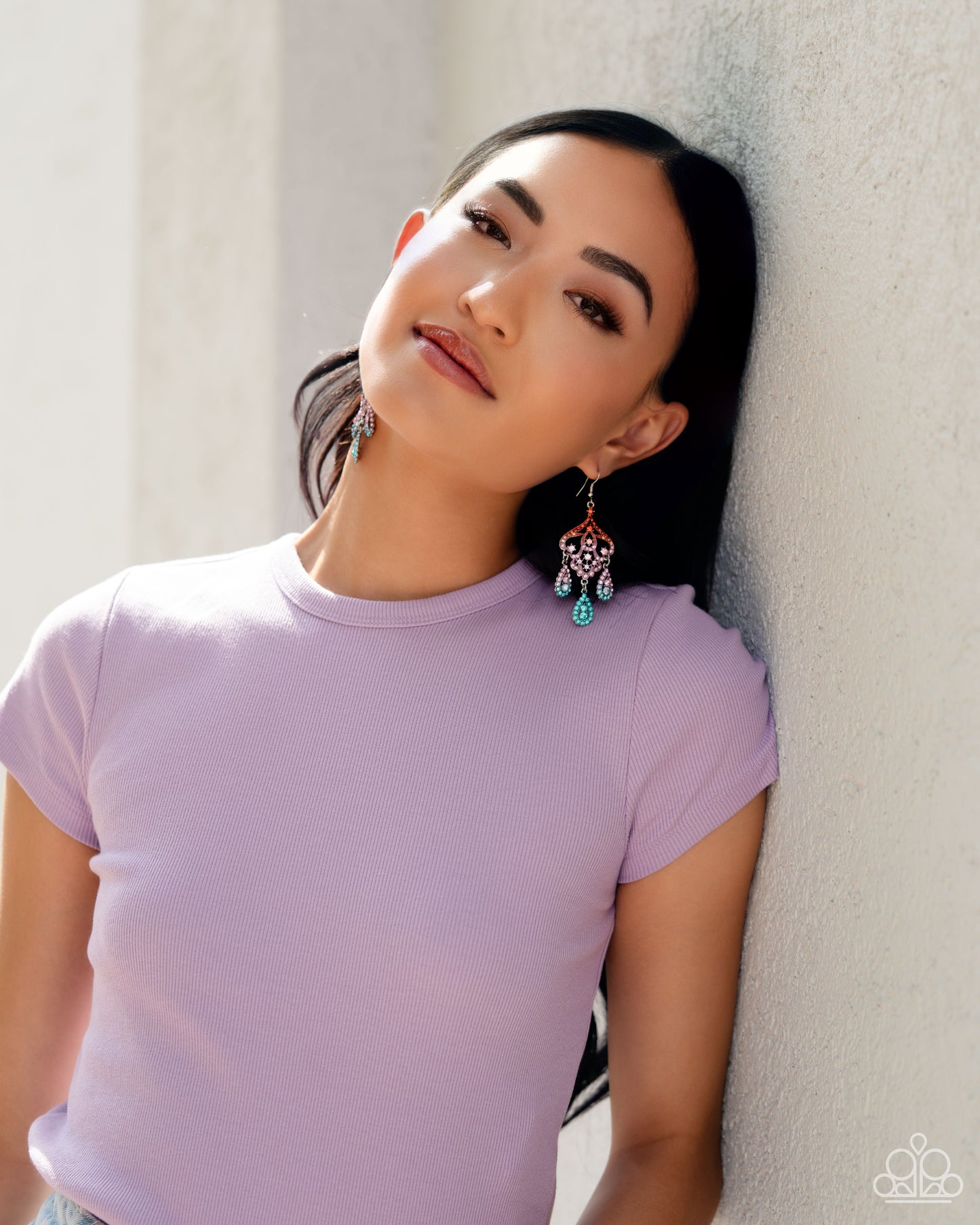 Paparazzi Accessories Chandelier Command - Multi Three rhinestone-encrusted teardrops drip from the bottom of an ornate decorative frame, creating an elegant fringe. The decorative frame swirls with ombré rhinestones that go from orange to pink to blue sh