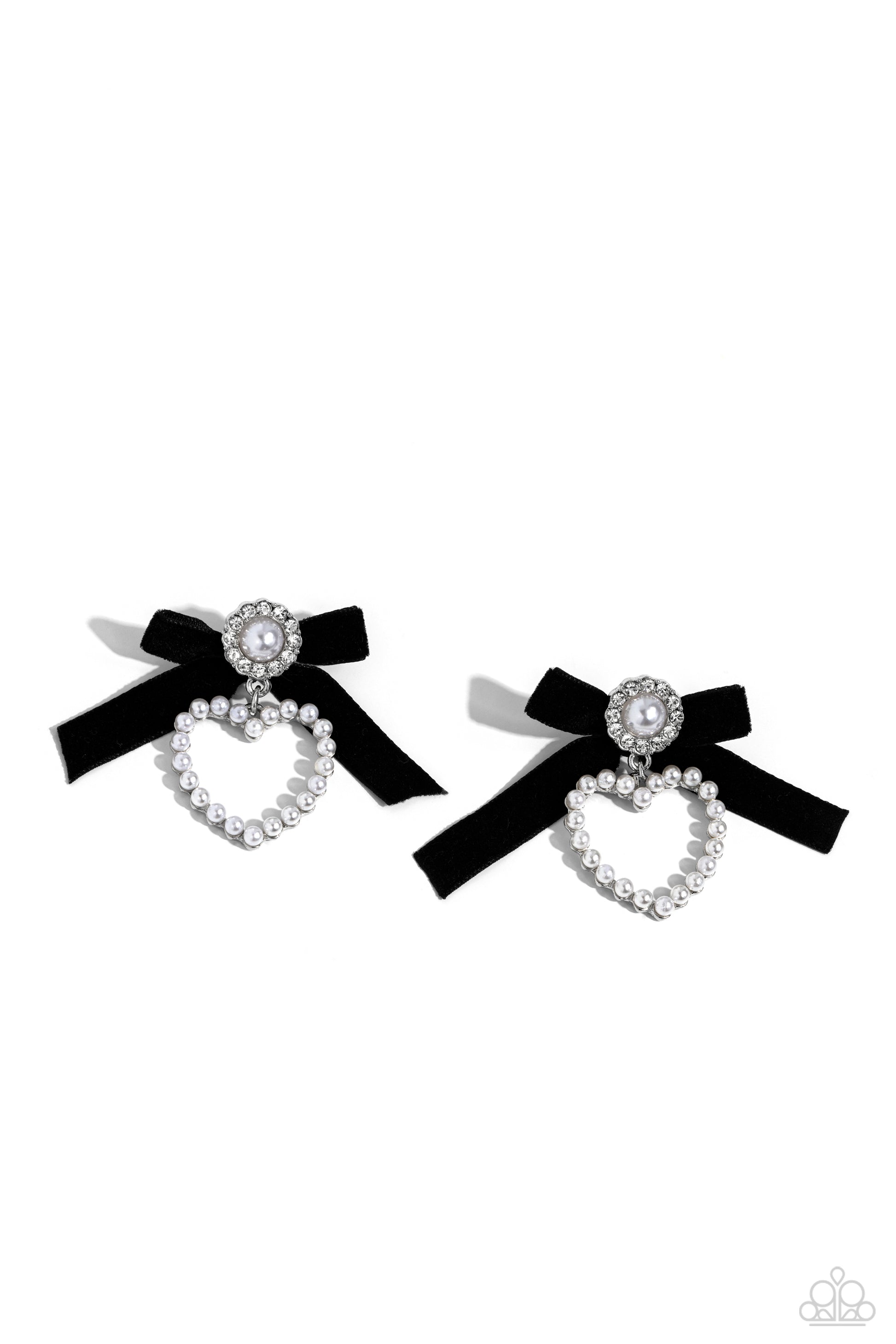 Paparazzi Accessories BOW and Then - Black A solitaire white pearl, pressed in a white rhinestone-encrusted hoop, gleams atop a pearl-dotted heart frame resulting in a dazzling statement piece. A black velvet ribbon fans out from the pearly centerpiece fu