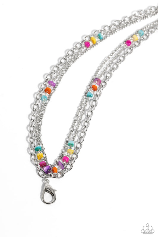 Paparazzi Accessories Seize the Stacks - Multi *Lanyard Featuring refreshing, chiseled turquoise, yellow, hot pink, orange, and purple shell-like beads, mismatched silver chains layer down the chest for a seasonal look. A lobster clasp hangs from the bott