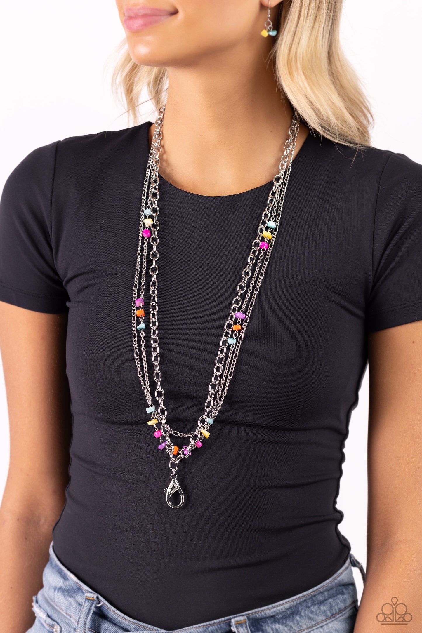 Paparazzi Accessories Seize the Stacks - Multi *Lanyard Featuring refreshing, chiseled turquoise, yellow, hot pink, orange, and purple shell-like beads, mismatched silver chains layer down the chest for a seasonal look. A lobster clasp hangs from the bott