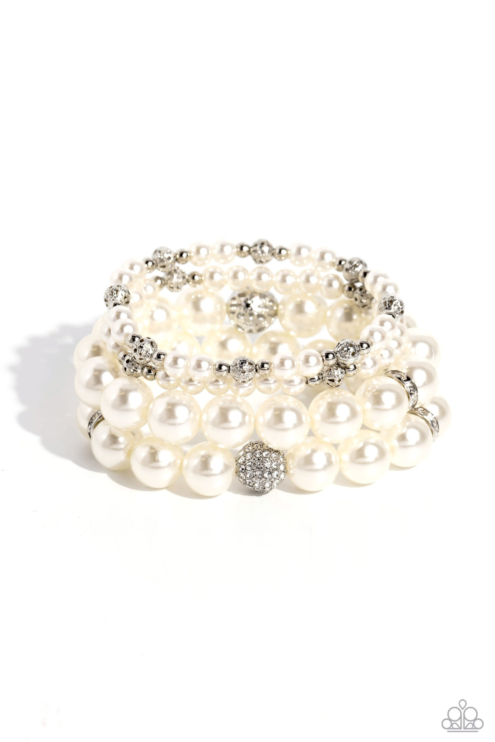 Paparazzi Accessories Vastly Vintage - White Infused with white rhinestone-encrusted silver beads, white rhinestone-encrusted discs, and textured silver beads, a bubbly collection of mismatched white pearls are threaded along stretchy bands around the wri