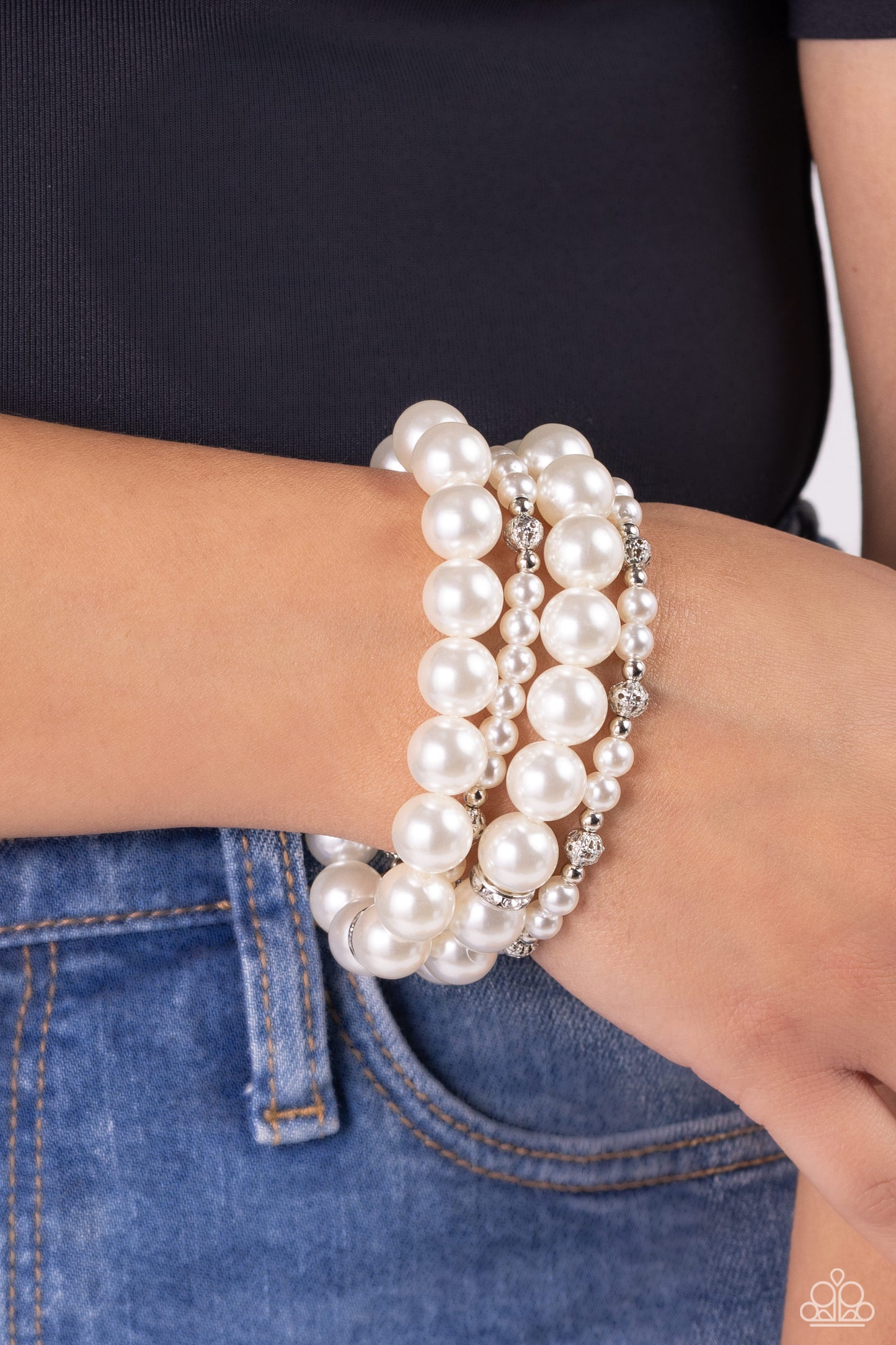 Paparazzi Accessories Vastly Vintage - White Infused with white rhinestone-encrusted silver beads, white rhinestone-encrusted discs, and textured silver beads, a bubbly collection of mismatched white pearls are threaded along stretchy bands around the wri