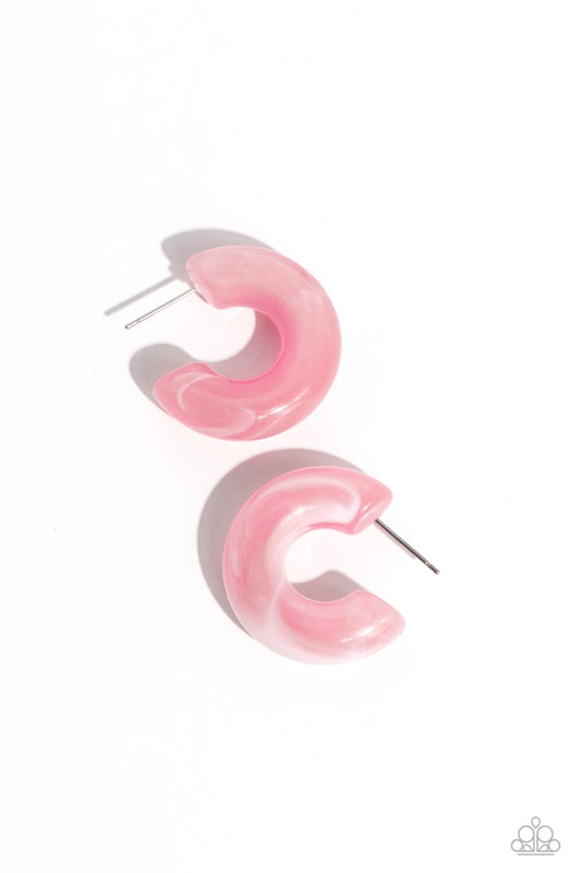 Paparazzi Accessories Acrylic Acclaim - Pink Featuring a milky accent, thick pink acrylic frames snugly loop and curl just below the ear for a fashionable finish. Earring attaches to a standard post fitting. Hoop measures approximately 1" in diameter. Sol