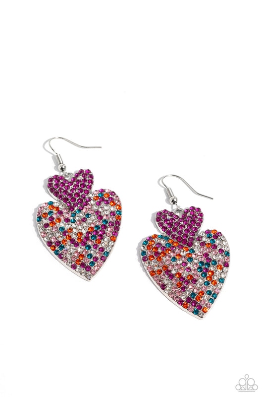 Paparazzi Accessories Flirting Flourish - Pink Embossed in dainty rhinestones, a fuchsia rhinestone-covered silver heart frame delicately links with a larger silver heart frame featuring fuchsia, light pink, blue, white, and orange rhinestones for a flirt