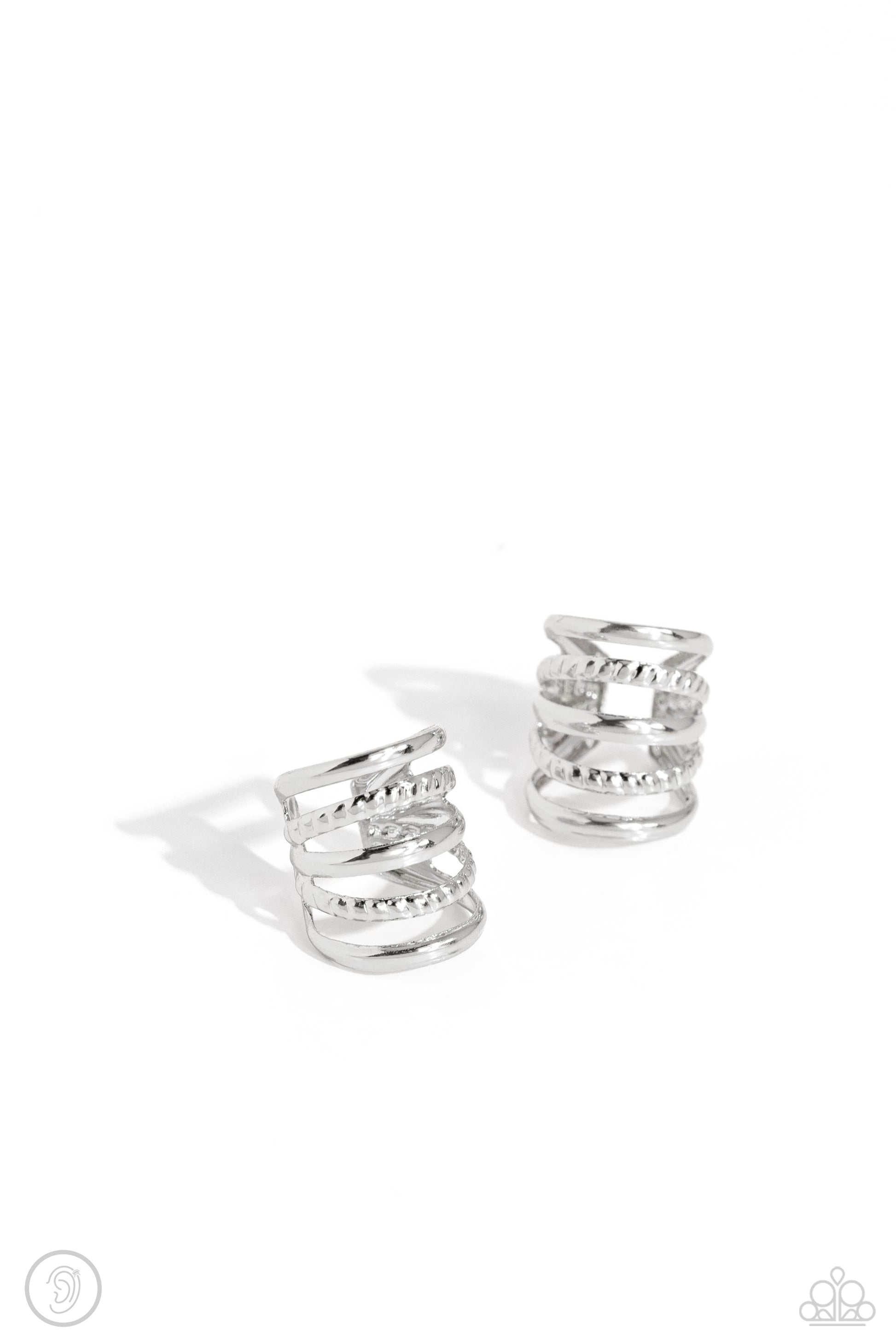 Paparazzi Accessories Flexible Fashion - Silver Mismatched sleek and textured silver bars arc around the ear in an airy, vertical pattern to create a trendy, adjustable, one-size-fits-all cuff. Sold as one pair of cuff earrings. Jewelry