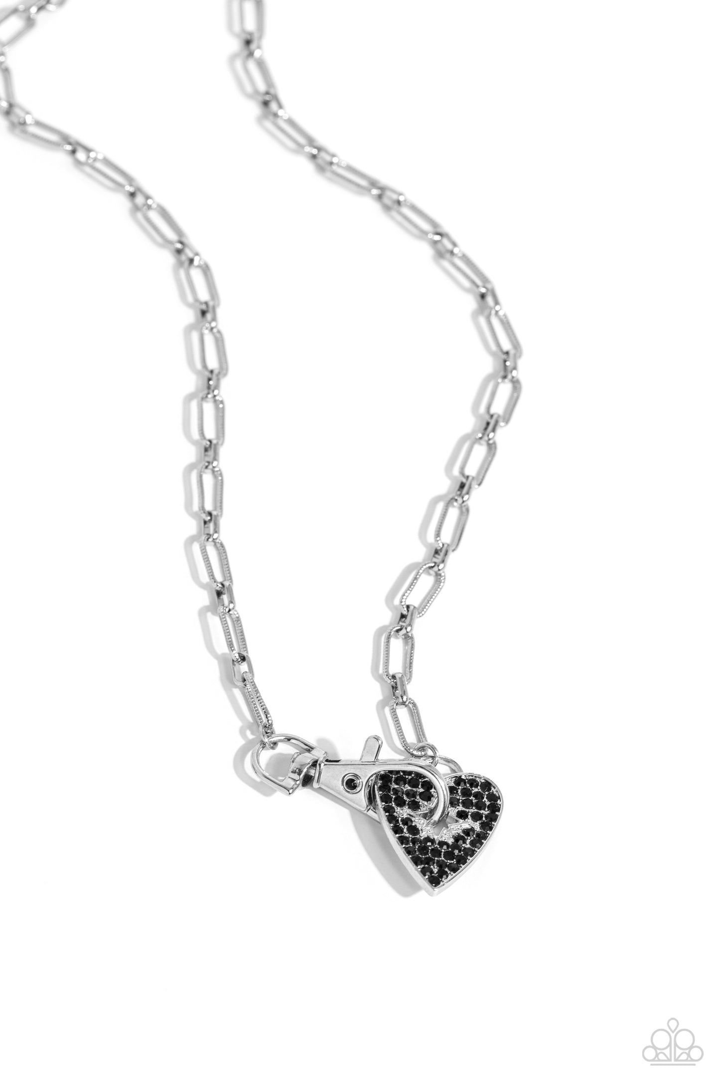 Paparazzi Accessories Radical Romance - Black Featuring a subtly studded finish, a silver paperclip chain leads the eye down to a black rhinestone-encrusted heart. A black rhinestone-embellished lobster clasp connects to the center of the heart display fo