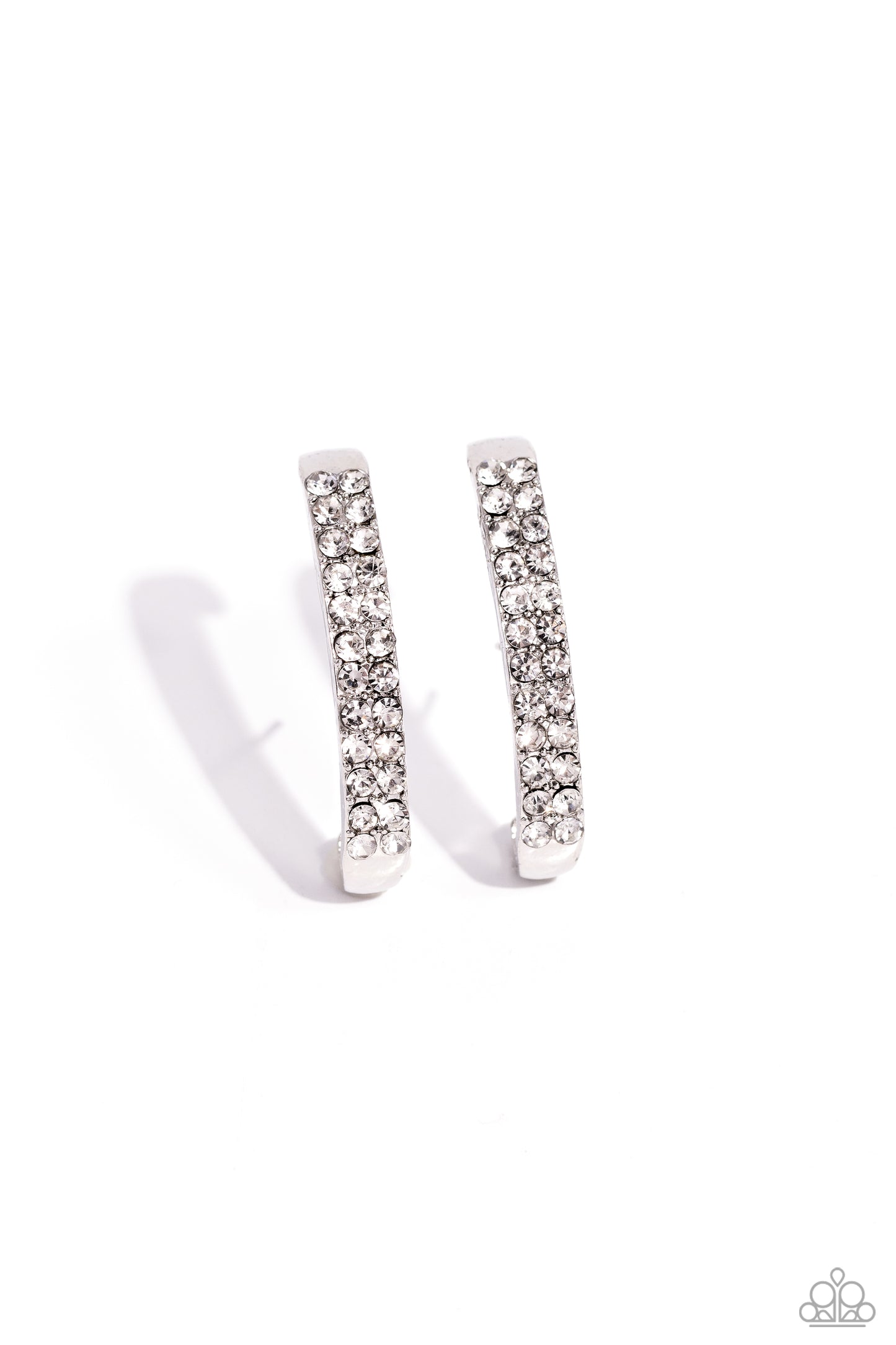 Paparazzi Accessories Sliding Series - White Two rows of glassy white rhinestones are set along the center of a curved silver bar for a refined display of dazzle. Features a sleek surface for sliding ability to desired position on the ear. Due to its stru