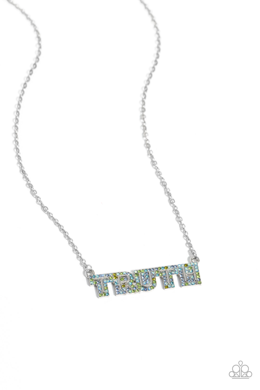 Paparazzi Accessories Truth Trinket - Blue Encrusted in glassy olive, Montana, aquamarine, and blue iridescent rhinestones, the silver word "TRUTH" connects to a dainty silver chain, creating an inspirational pendant below the collar. Features an adjustab