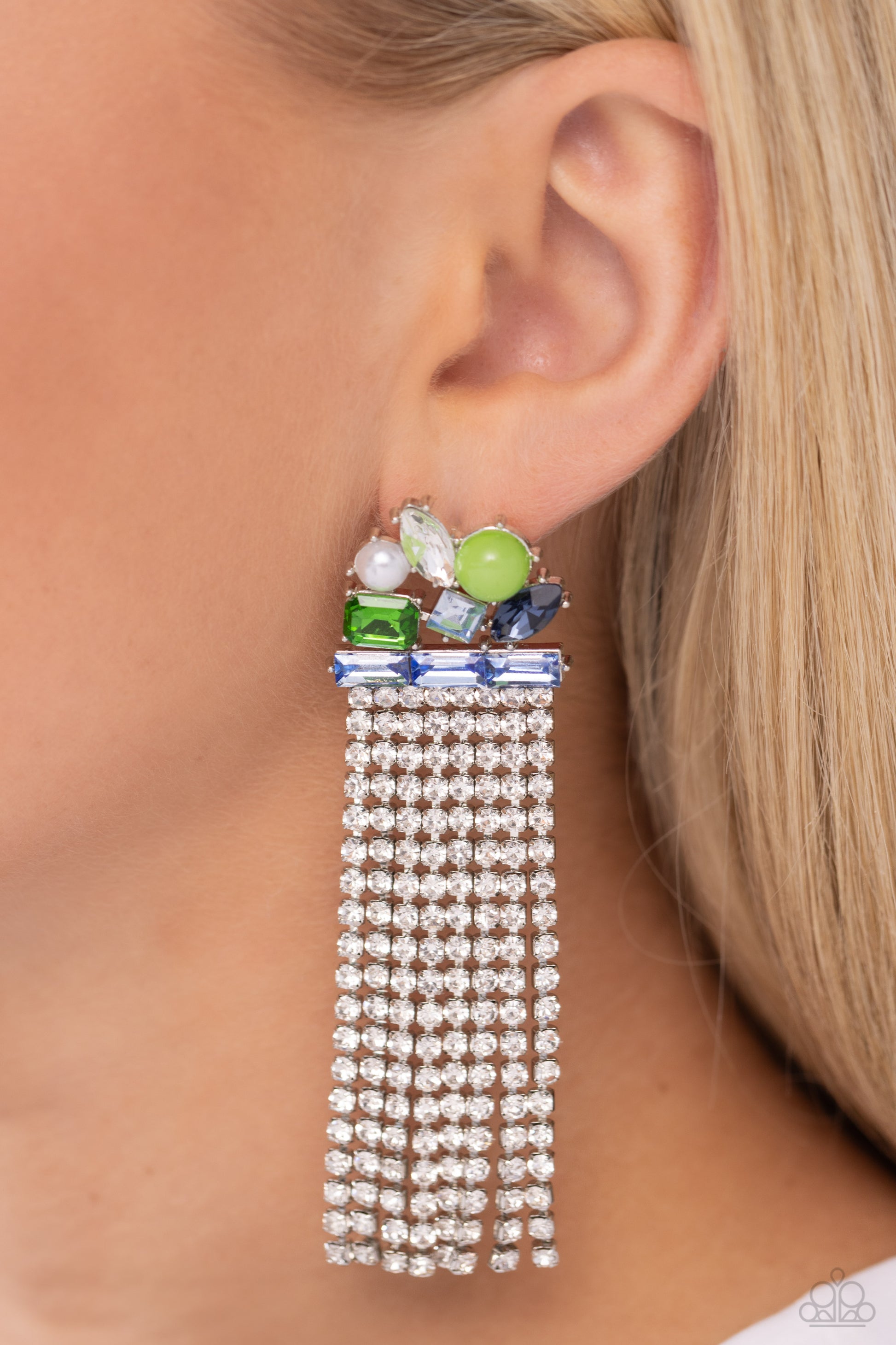 Paparazzi Accessories Horizontal Hallmark - Blue Featuring pronged silver fittings, a trio of blue emerald-cut gems lay across the ear in a horizontal manner. Various green, white, and blue gems and a milky green bead and white pearl haphazardly cluster u