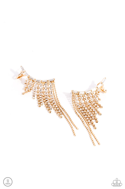 Paparazzi Accessories Tapered Tease - Gold A tapered fringe of dainty gold popcorn chains and glittery strands of white rhinestones in square fittings cascades from the edge of a white emerald-cut, gem-encrusted curved frame, creating an edgy centerpiece.