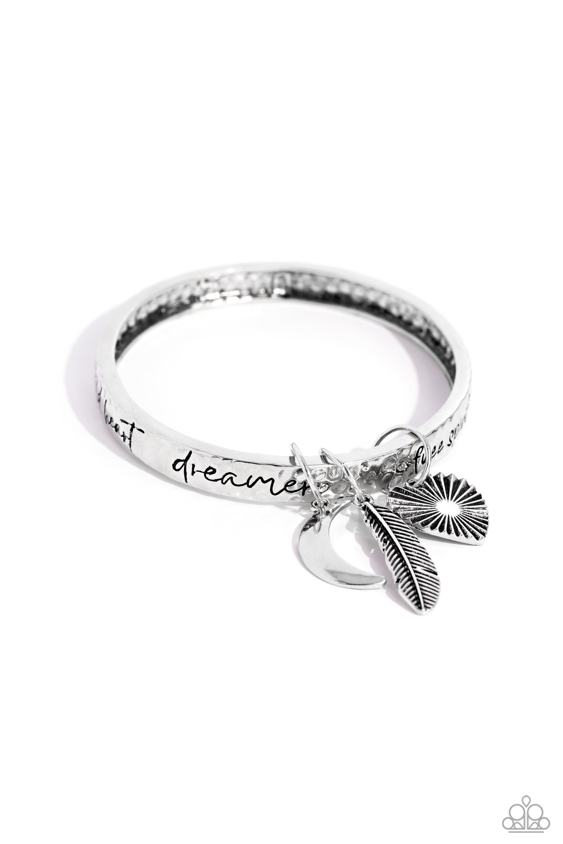 Paparazzi Accessories Free-Spirited Fantasy - Silver A hammered silver bangle featuring a textured feather, sleek crescent moon, and textured heart charms wraps around the wrist for an artisan-inspired fashion. Painted in a black hue, the phrases “free sp