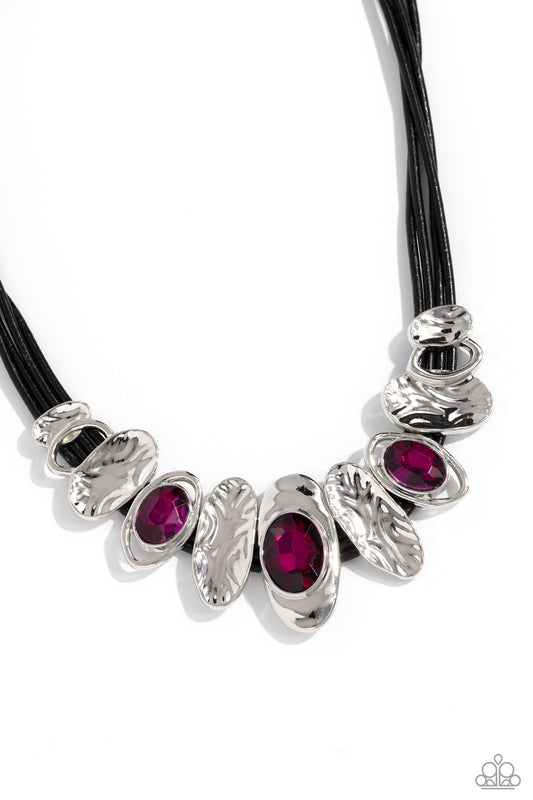 Paparazzi Accessories Sliding Splendor - Pink Featuring a lightly hammered sheen, asymmetrical silver ovals, some with airy silhouettes and exaggerated fuchsia gem centers, give off a hand-made feel as they shift and slide through multiple strands of blac