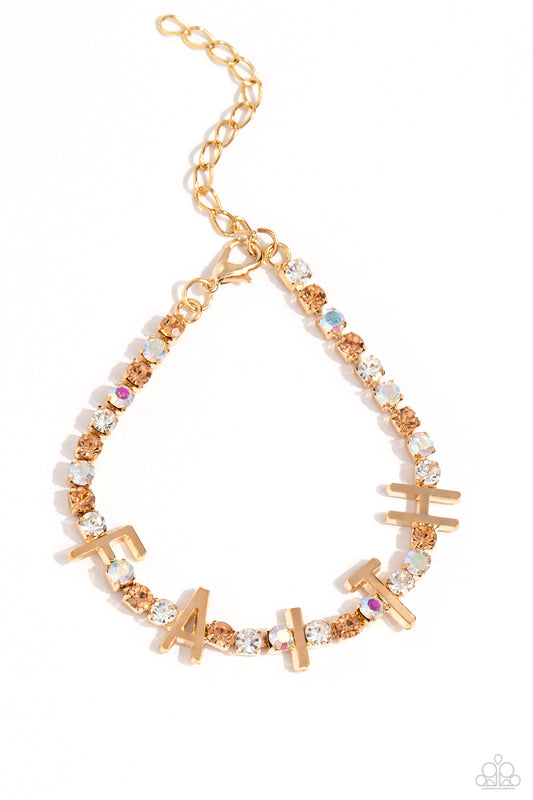 Paparazzi Accessories In Good Faith - Gold Set in gold square fittings, various multicolored rhinestones gleam around the wrist. Infused along the design, sleek gold letters spell out the word "FAITH" for an inspirational finish. Features an adjustable cl