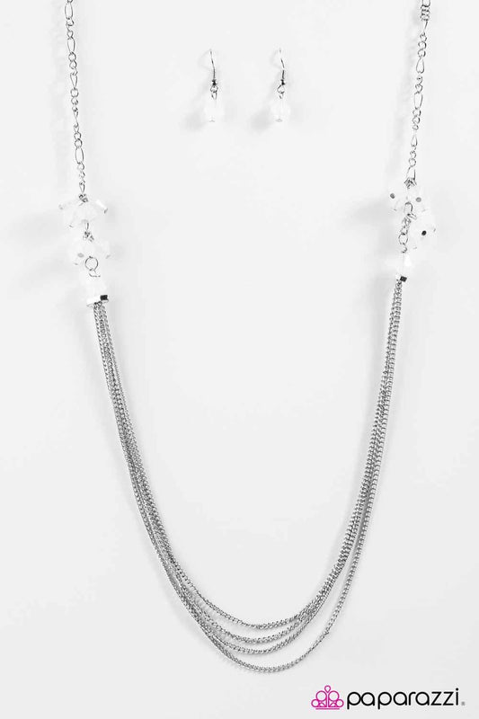 Paparazzi Accessories Movin and Groovin - White Faceted white gems give way to trestles of silver chains creating refined layers. Additional glittery gems climb the shimmery silver chains, adding a playful and flirty flair. Features an adjustable clasp cl